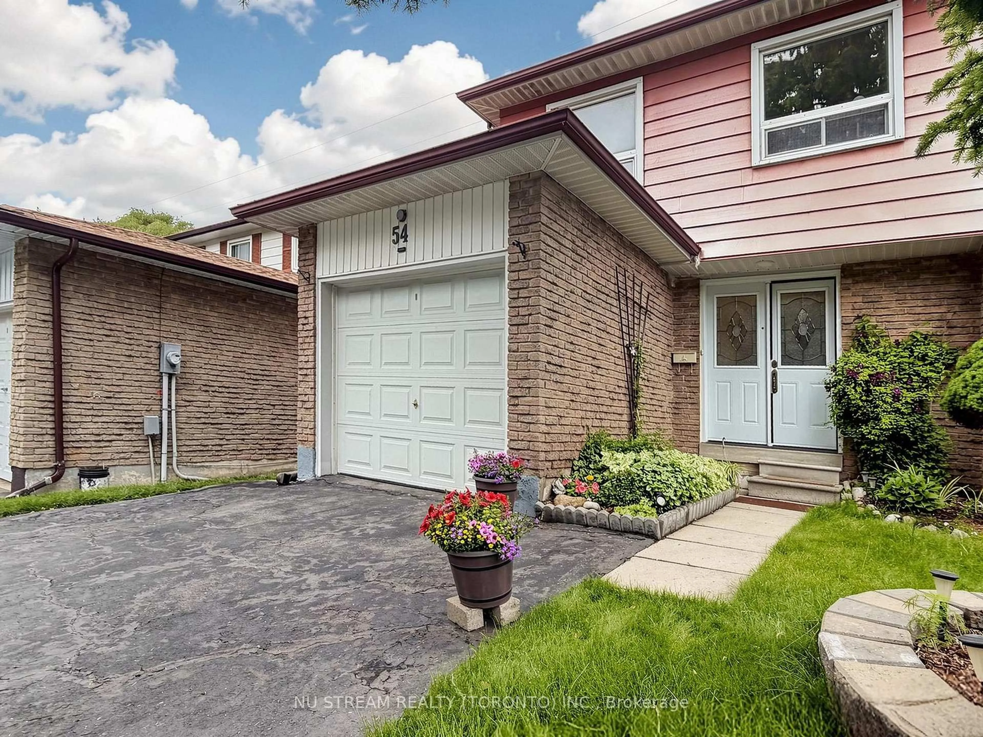 Home with brick exterior material, street for 54 Ashridge Dr, Toronto Ontario M1V 1P2