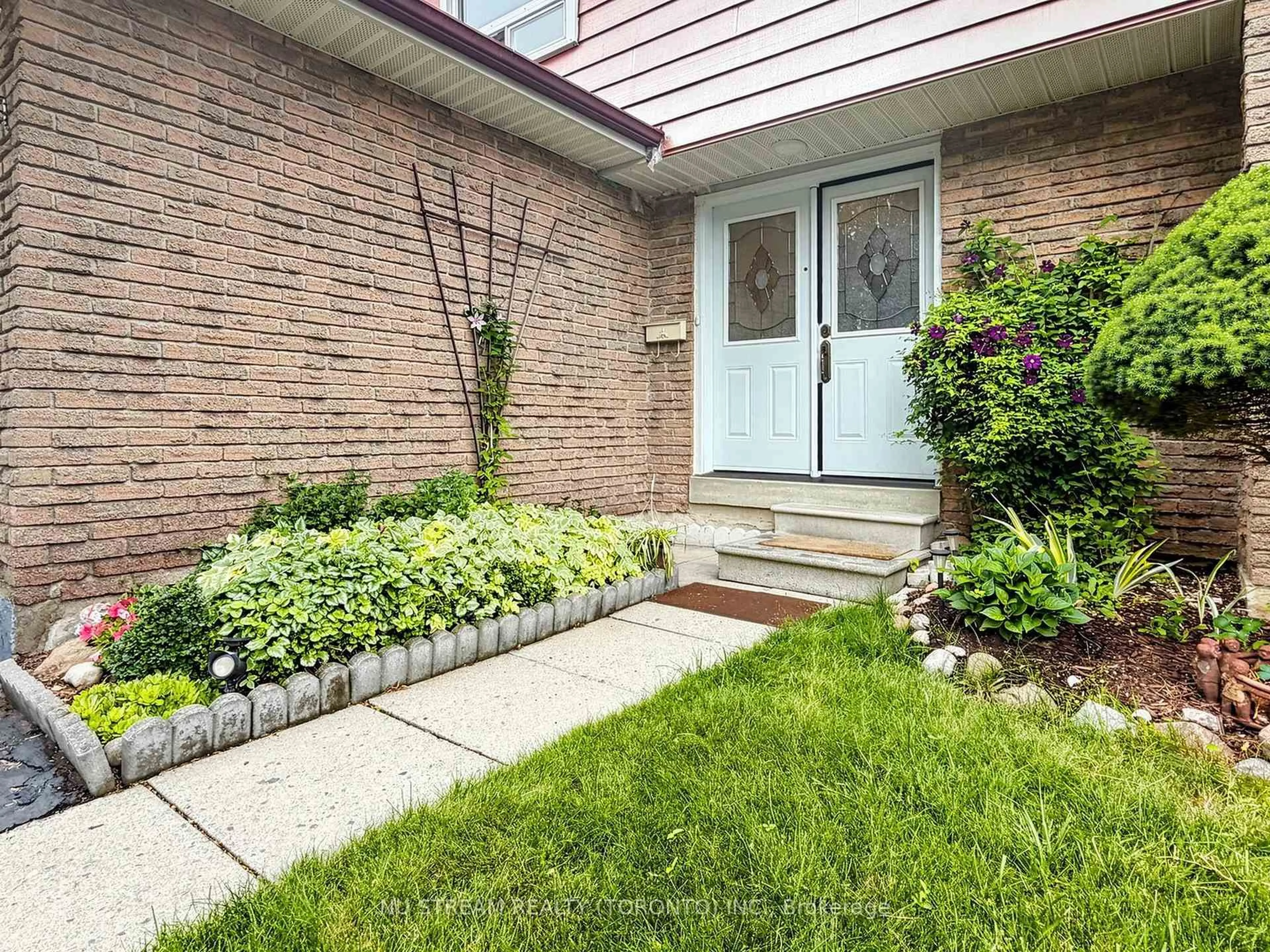 Home with brick exterior material, street for 54 Ashridge Dr, Toronto Ontario M1V 1P2