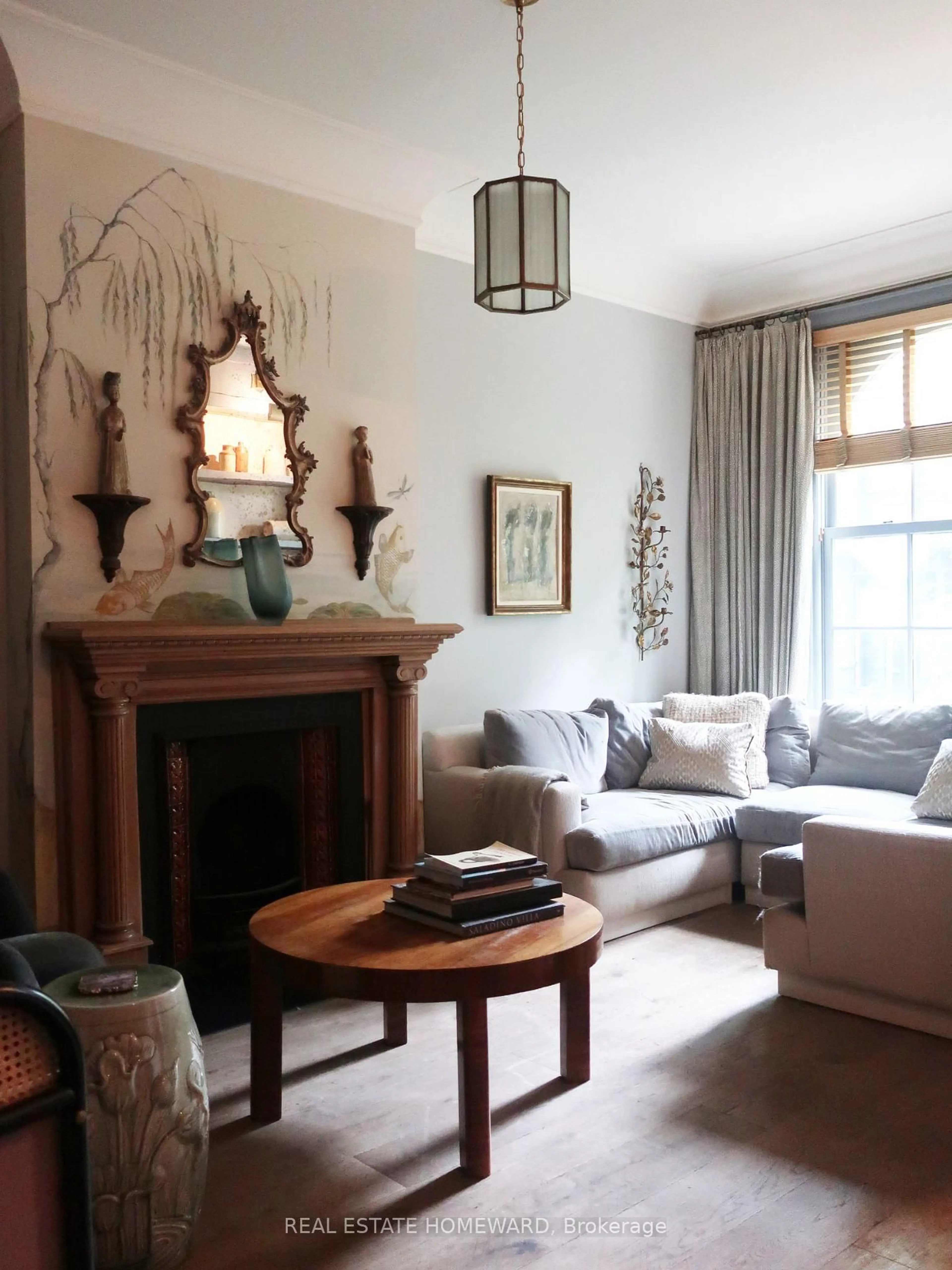 Living room with furniture, wood/laminate floor for 45 Grant St, Toronto Ontario M4M 2H6