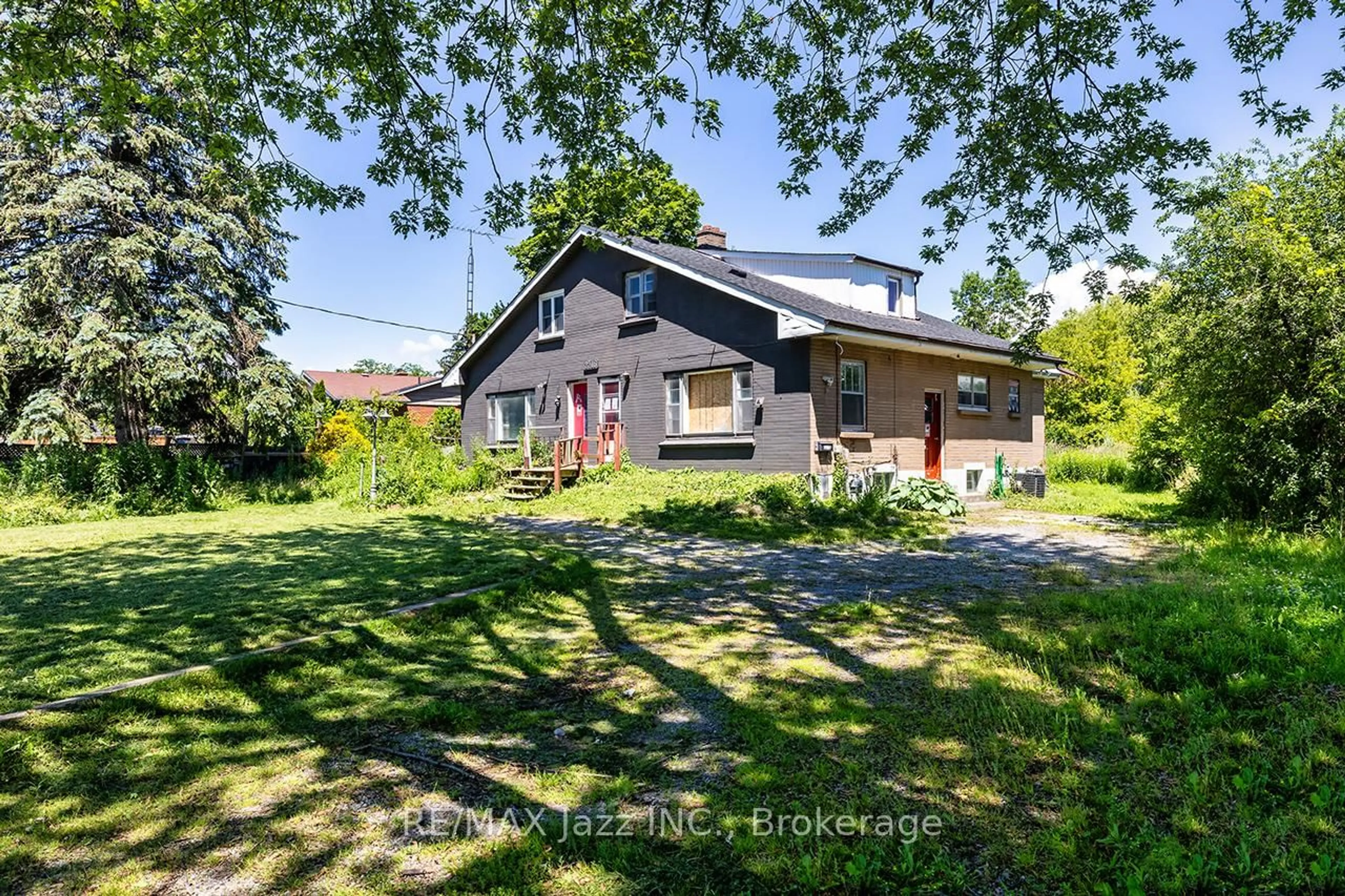 A pic from outside/outdoor area/front of a property/back of a property/a pic from drone, street for 2216 Highway 2, Clarington Ontario L1C 6C3