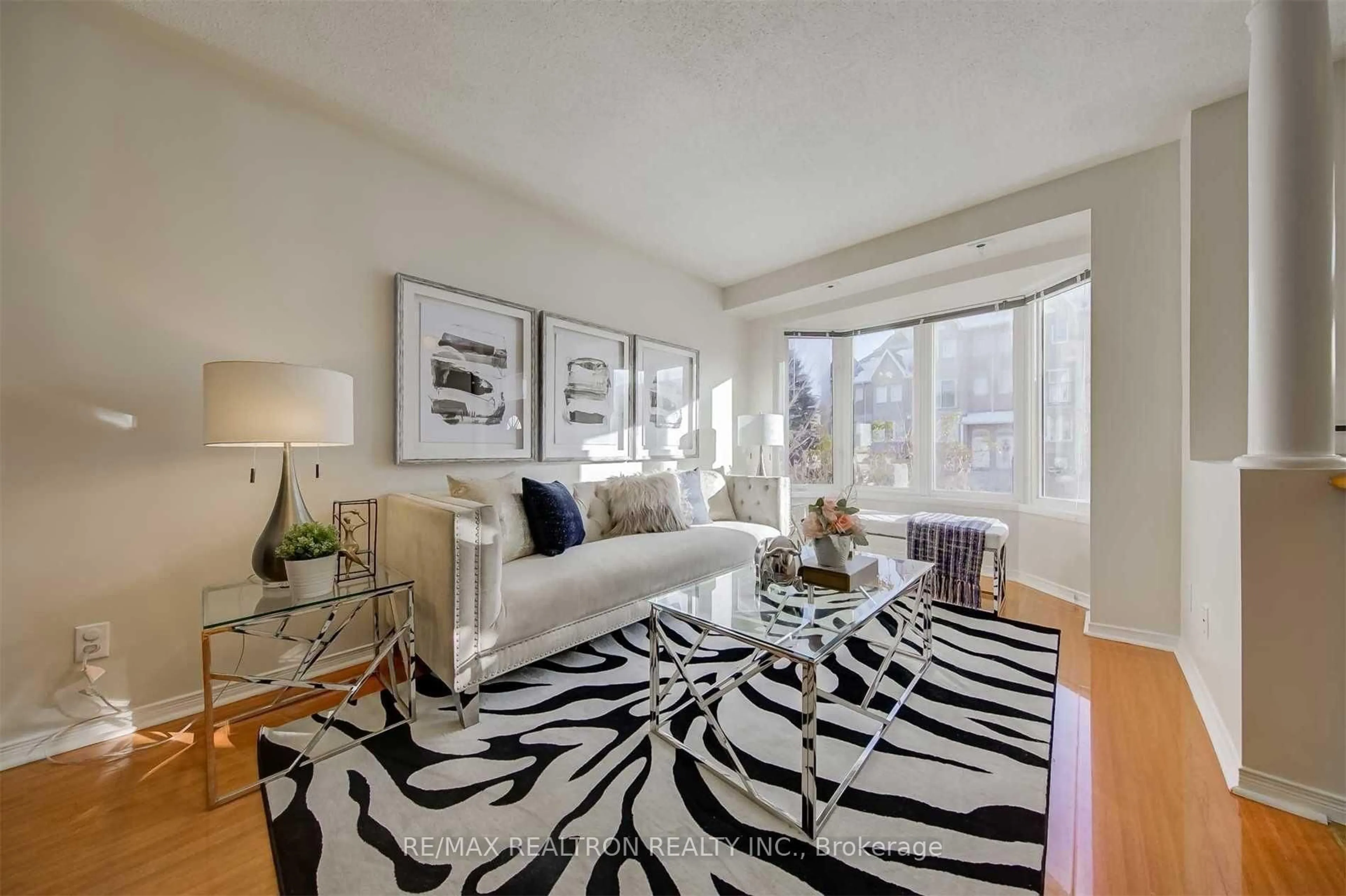 Living room with furniture, carpet floor for 28 Rosebank Dr #612, Toronto Ontario M1B 5Z1