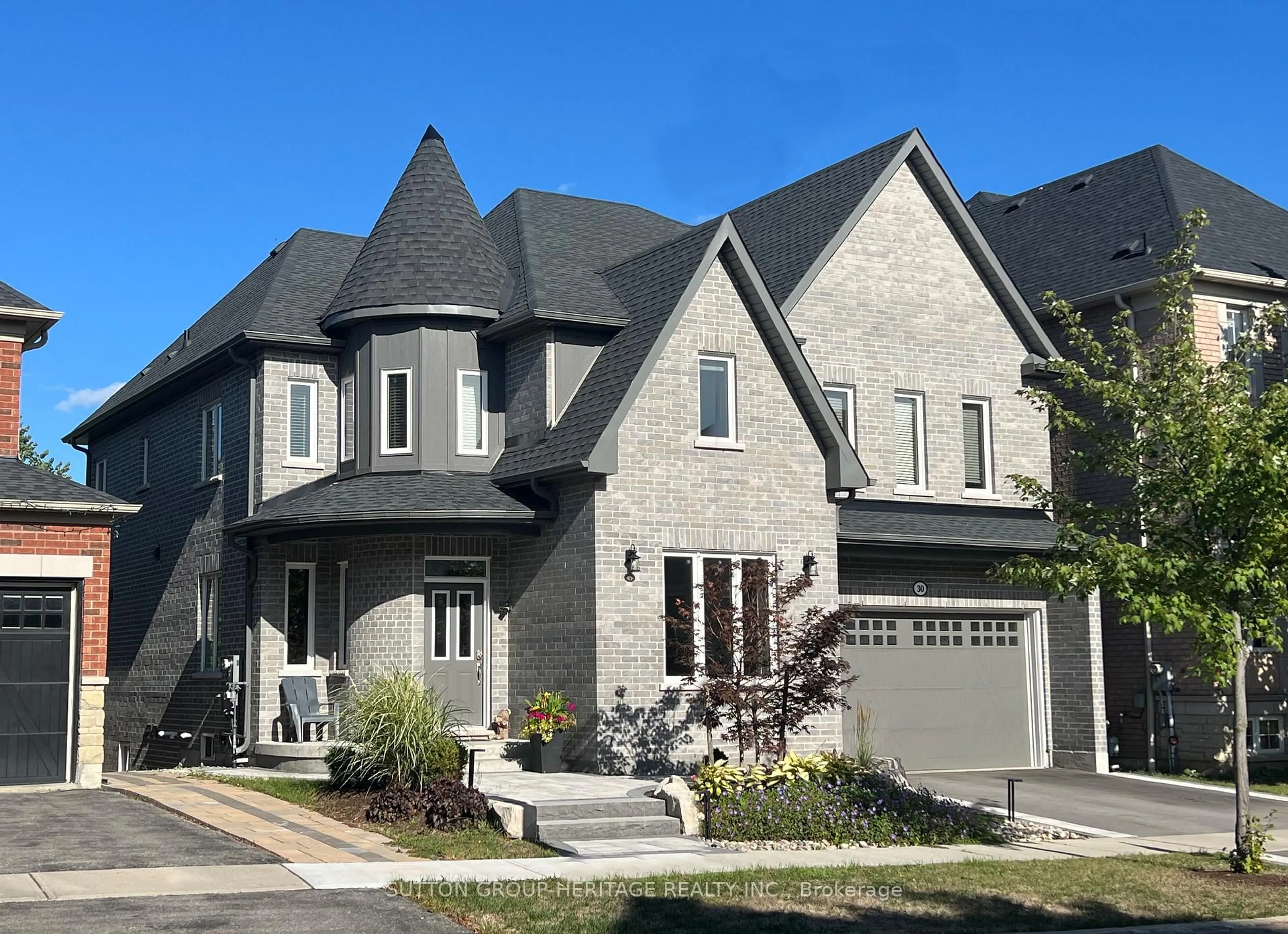 Home with brick exterior material, street for 30 Hunwicks Cres, Ajax Ontario L1Z 0E4