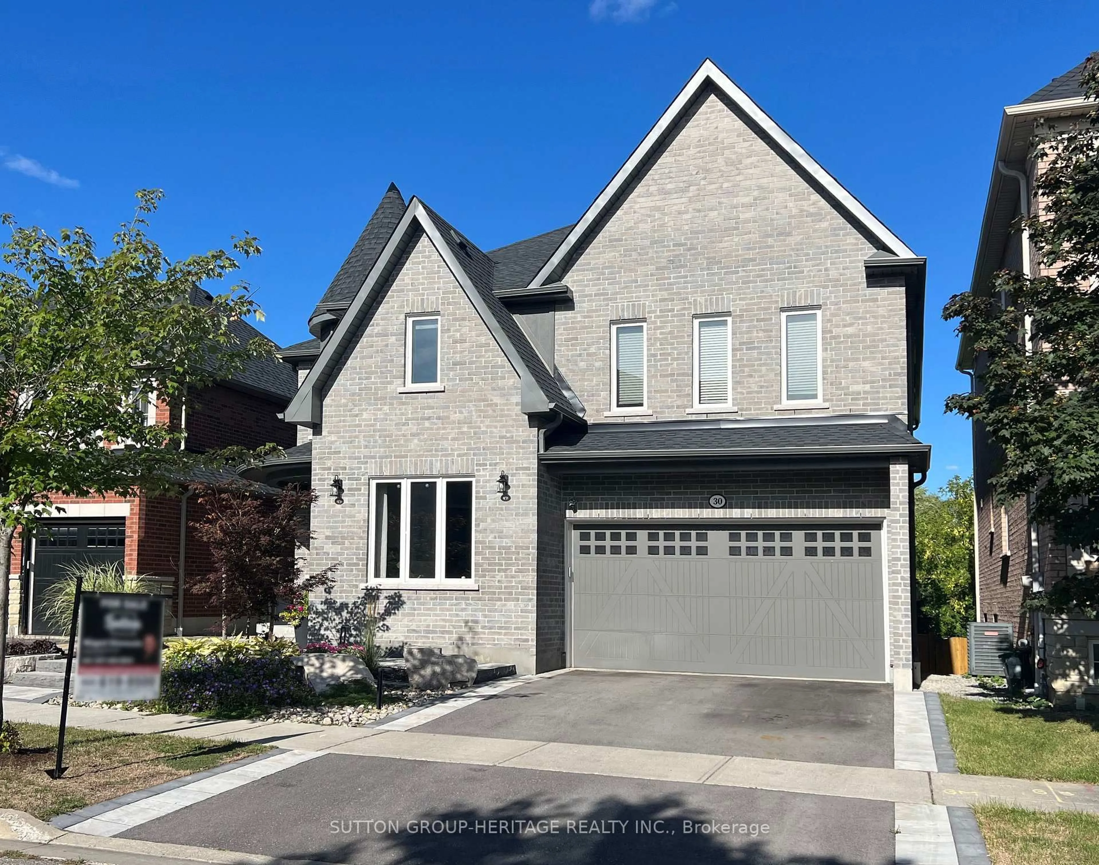 Home with brick exterior material, street for 30 Hunwicks Cres, Ajax Ontario L1Z 0E4