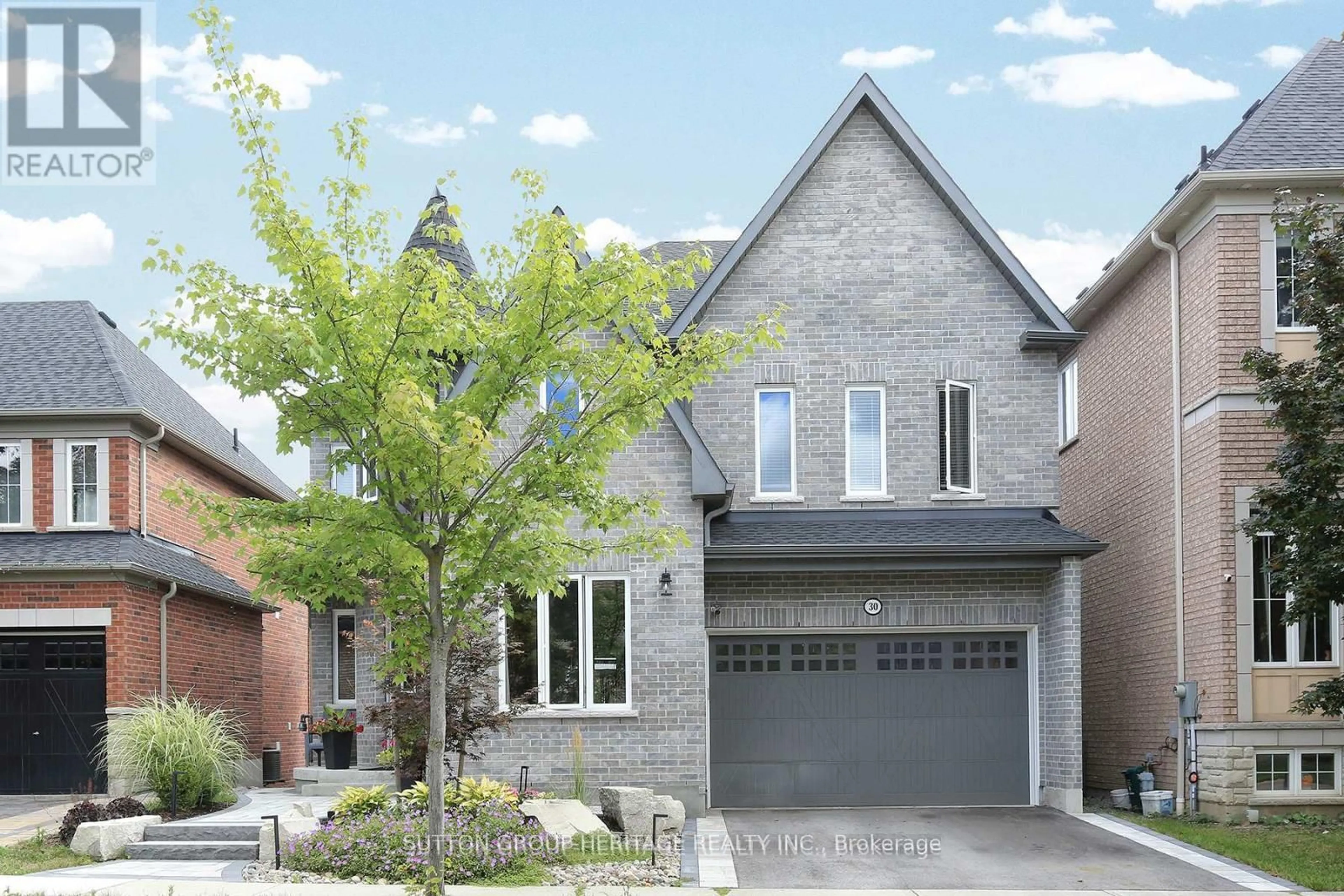 Home with brick exterior material, street for 30 Hunwicks Cres, Ajax Ontario L1Z 0E4