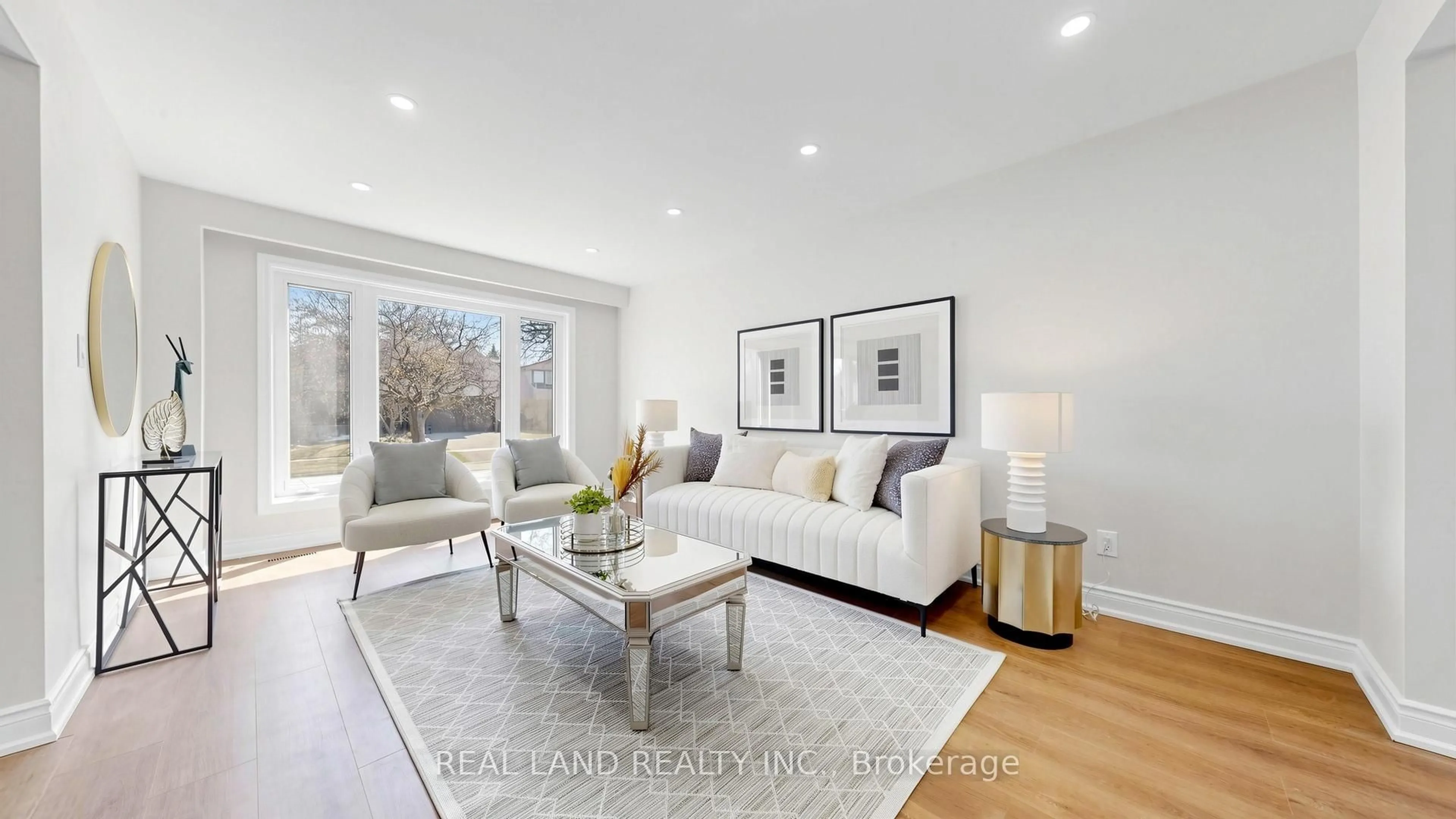 Living room with furniture, wood/laminate floor for 54 Marblemount Cres, Toronto Ontario M1T 2H4