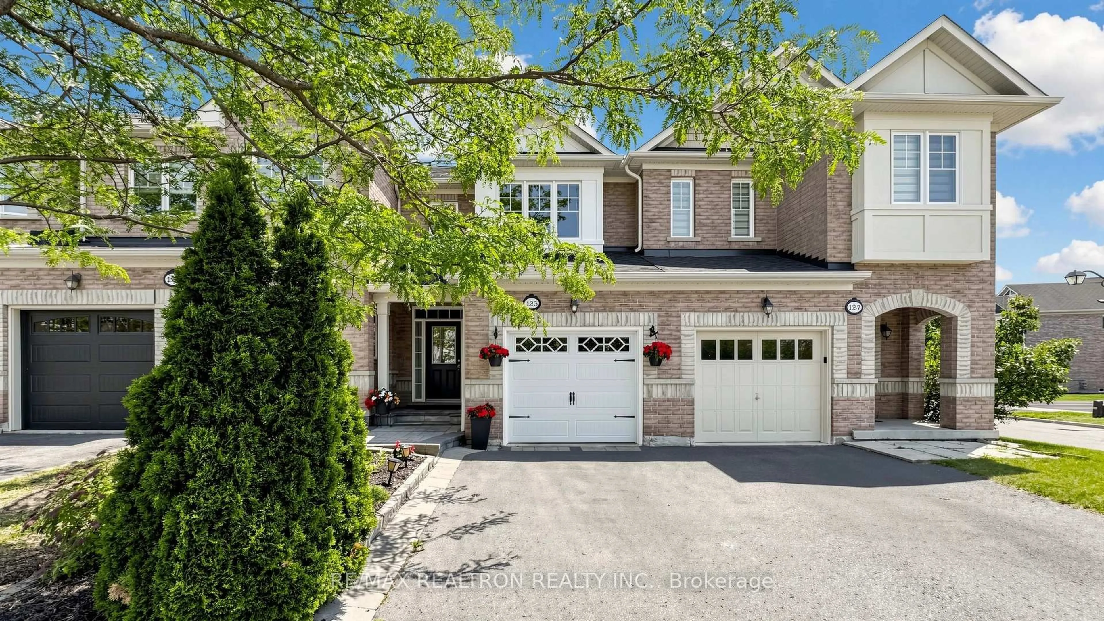 Home with brick exterior material, street for 125 Silverwood Circ, Ajax Ontario L1Z 0A4