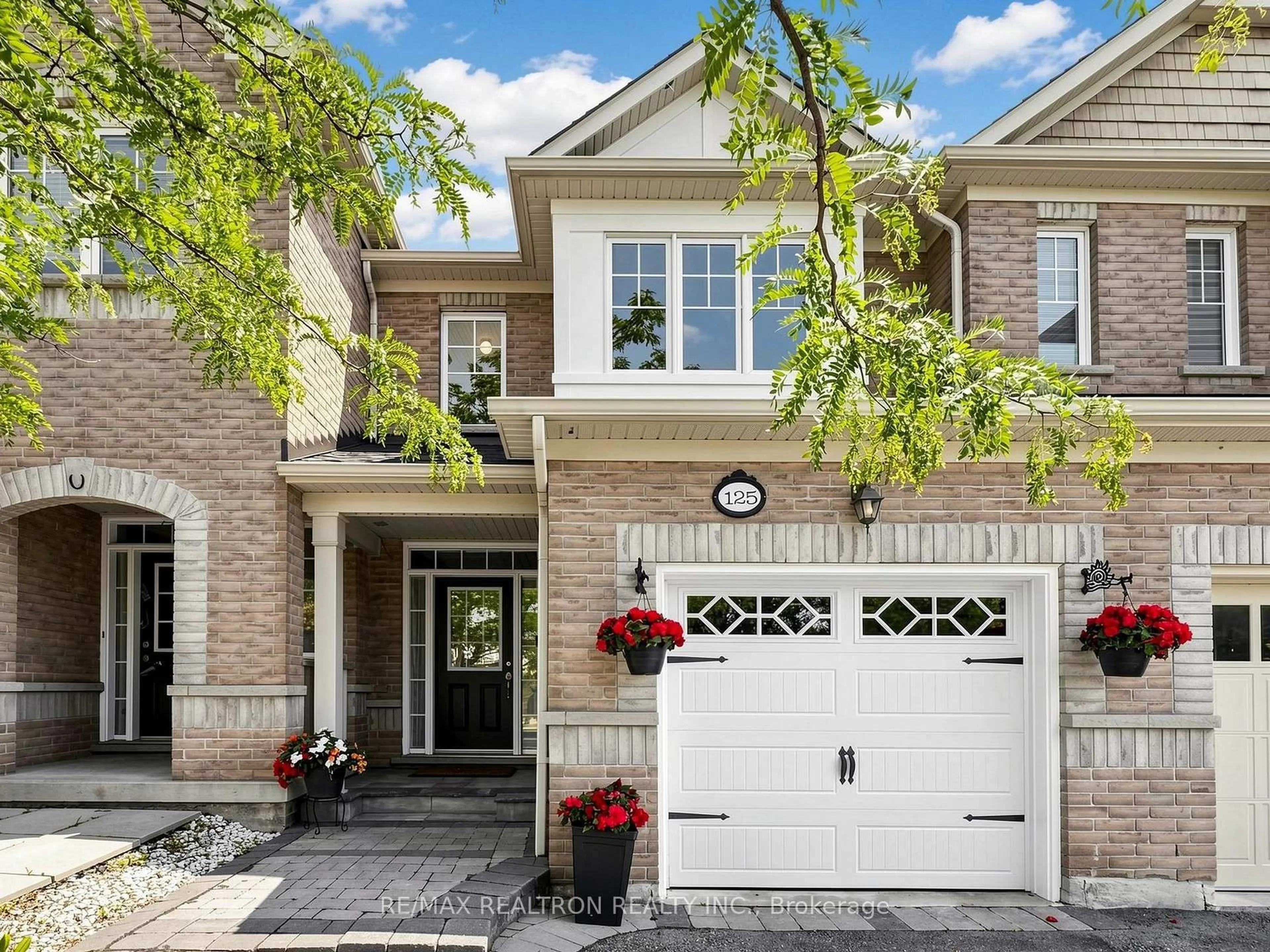 Home with brick exterior material, street for 125 Silverwood Circ, Ajax Ontario L1Z 0A4