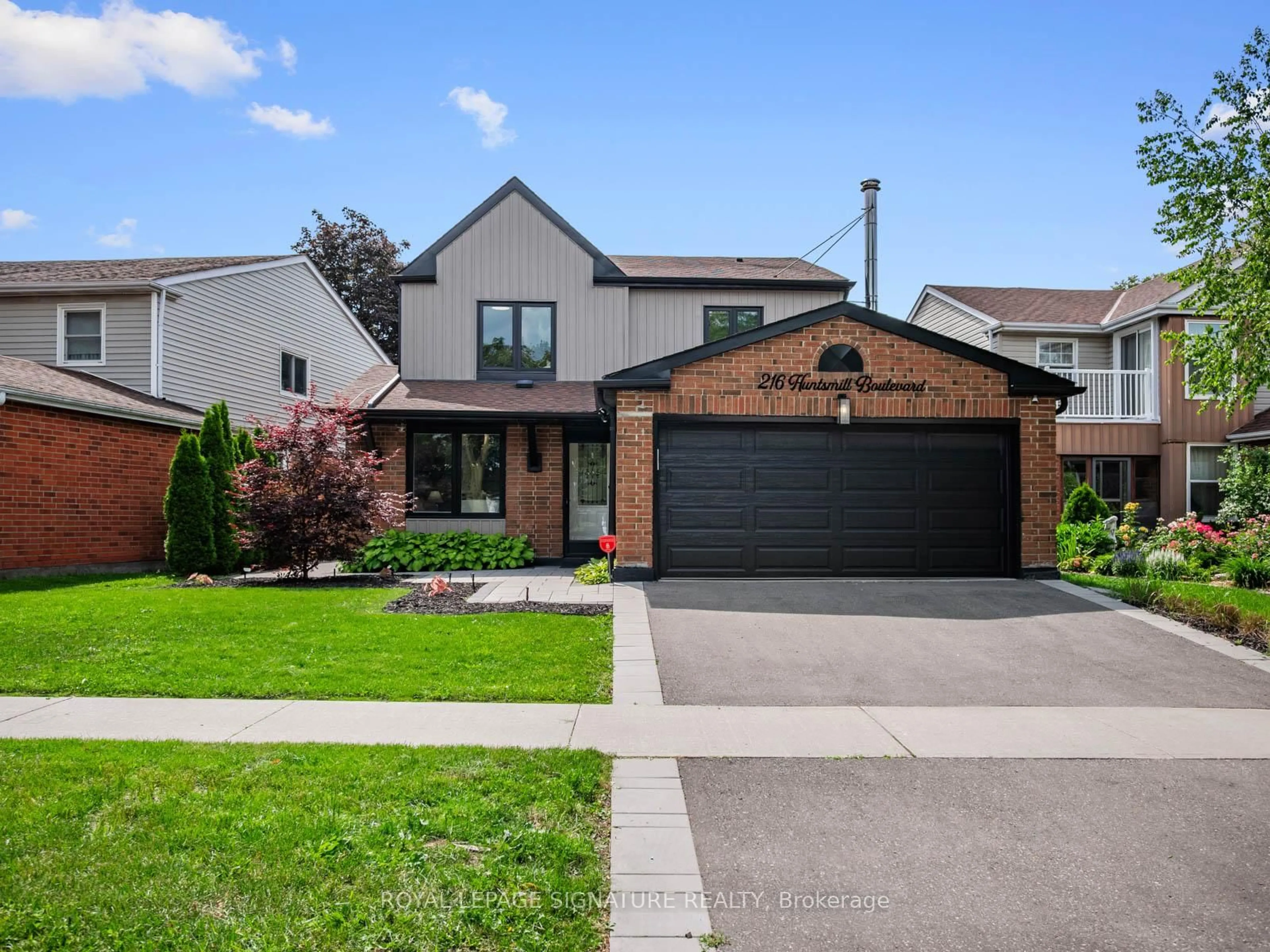 Home with brick exterior material, street for 216 Huntsmill Blvd, Toronto Ontario M1W 3E1