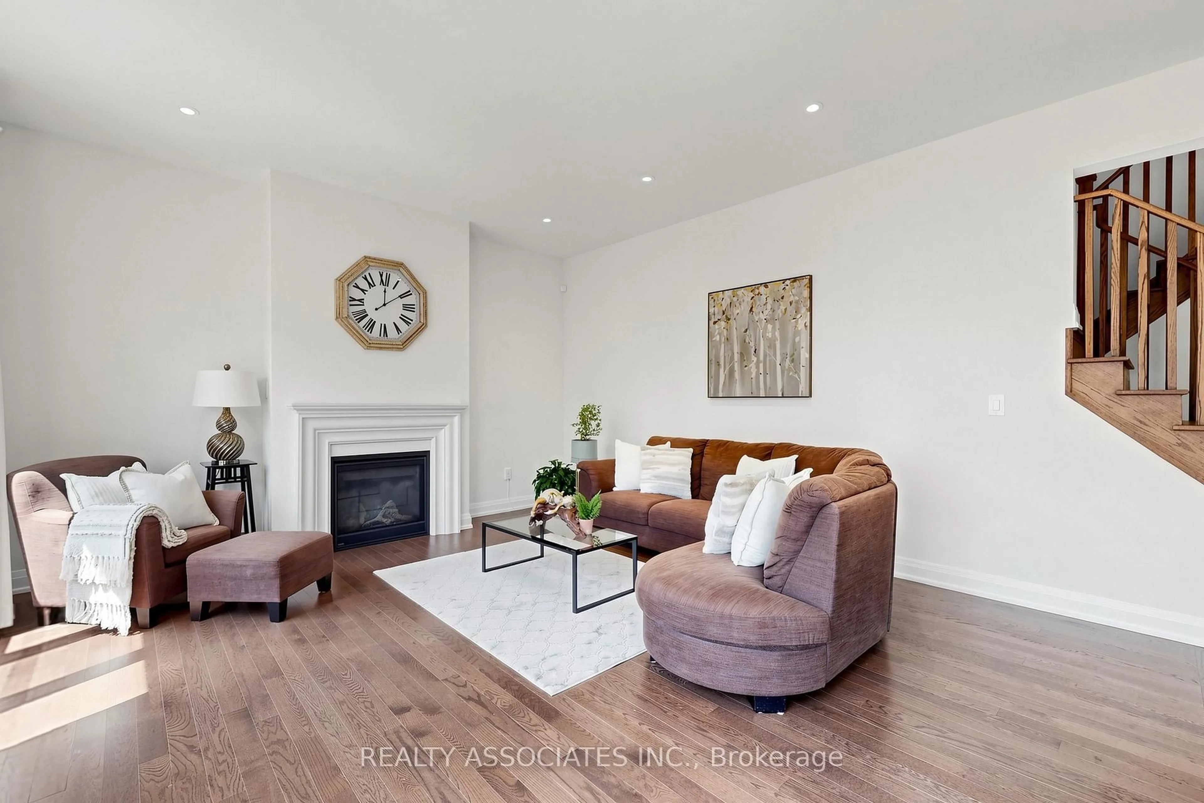 Living room with furniture, wood/laminate floor for 4029 Ellesmere Rd, Toronto Ontario M1C 1J3