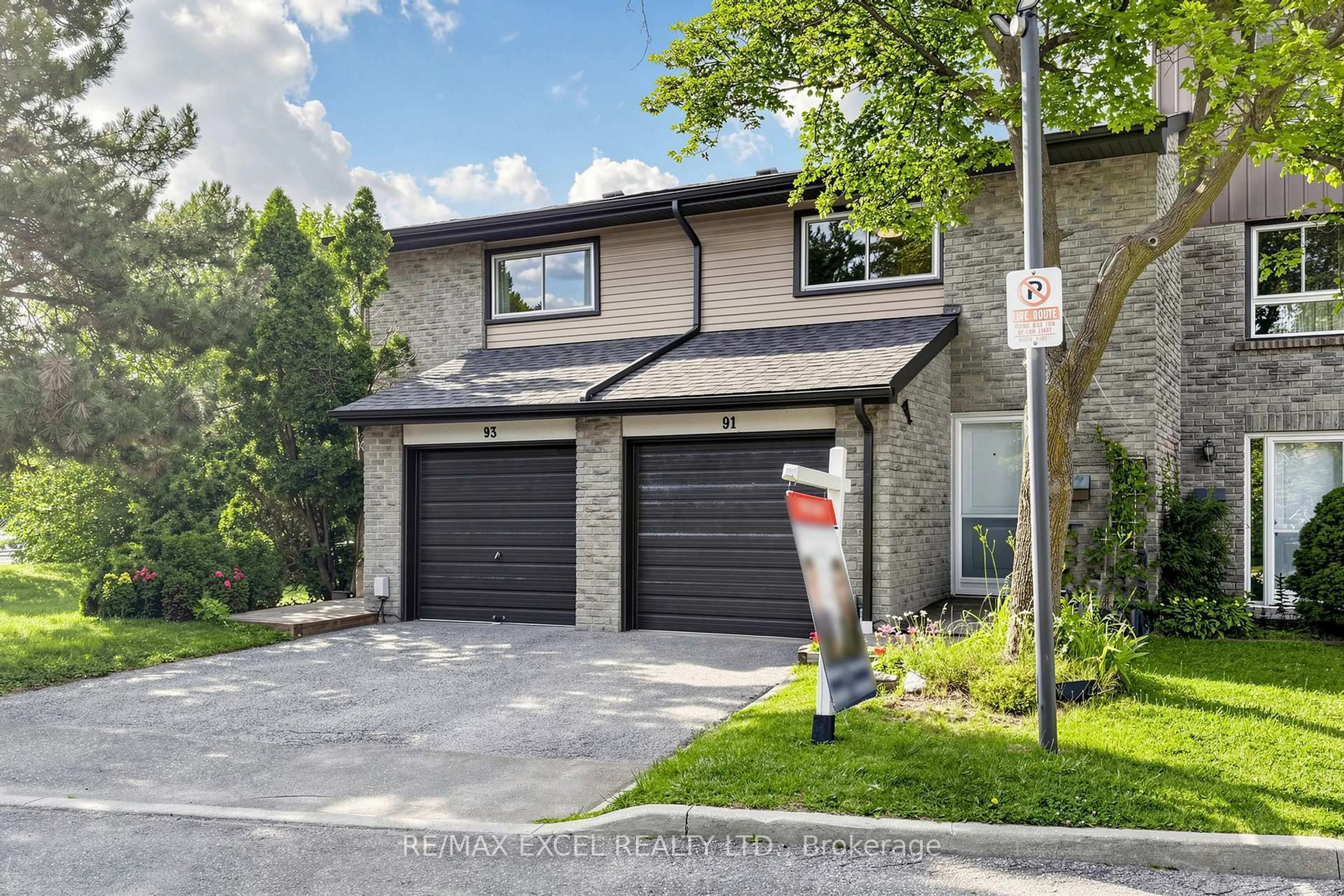 Home with brick exterior material, street for 1131 Sandhurst Circ #91, Toronto Ontario M1V 1V5