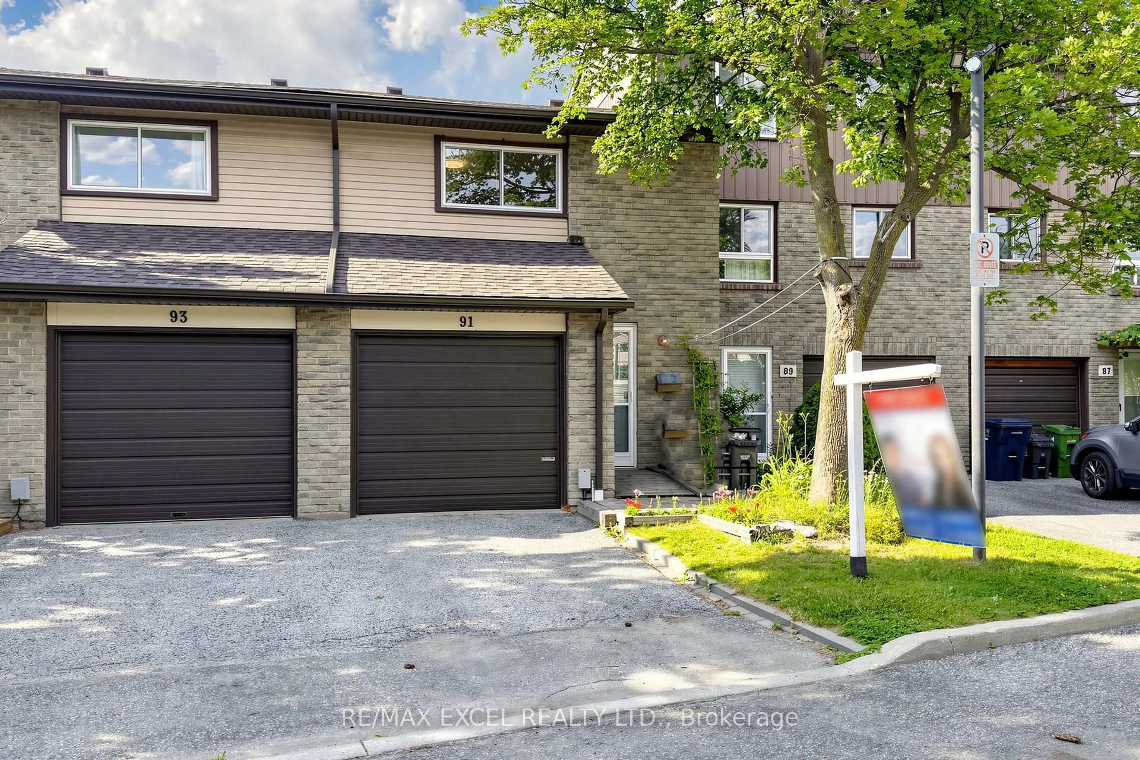 Home with brick exterior material, street for 1131 Sandhurst Circ #91, Toronto Ontario M1V 1V5