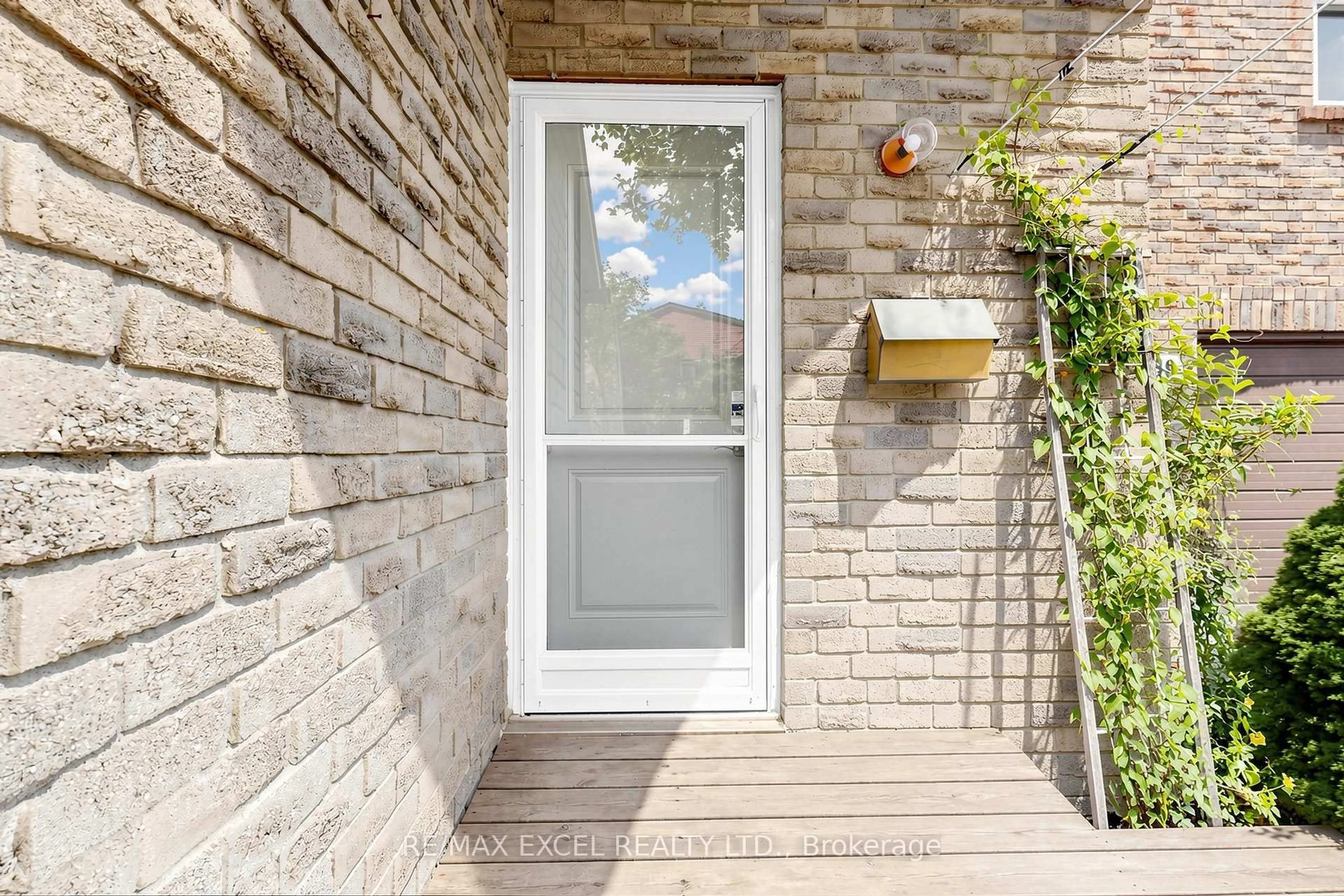 Home with brick exterior material, street for 1131 Sandhurst Circ #91, Toronto Ontario M1V 1V5