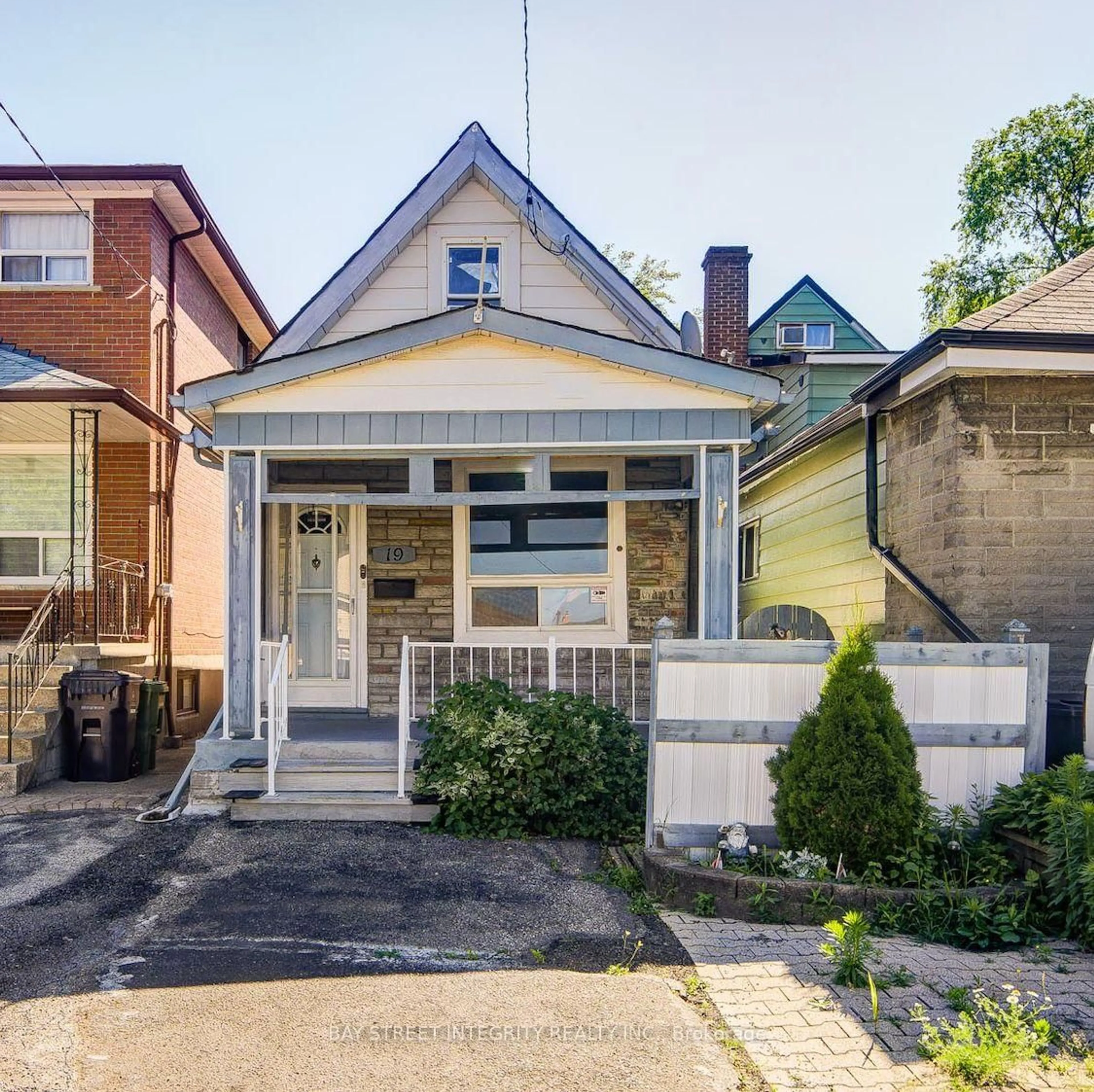 Home with brick exterior material, street for 19 Robinson Ave, Toronto Ontario M1L 3S8
