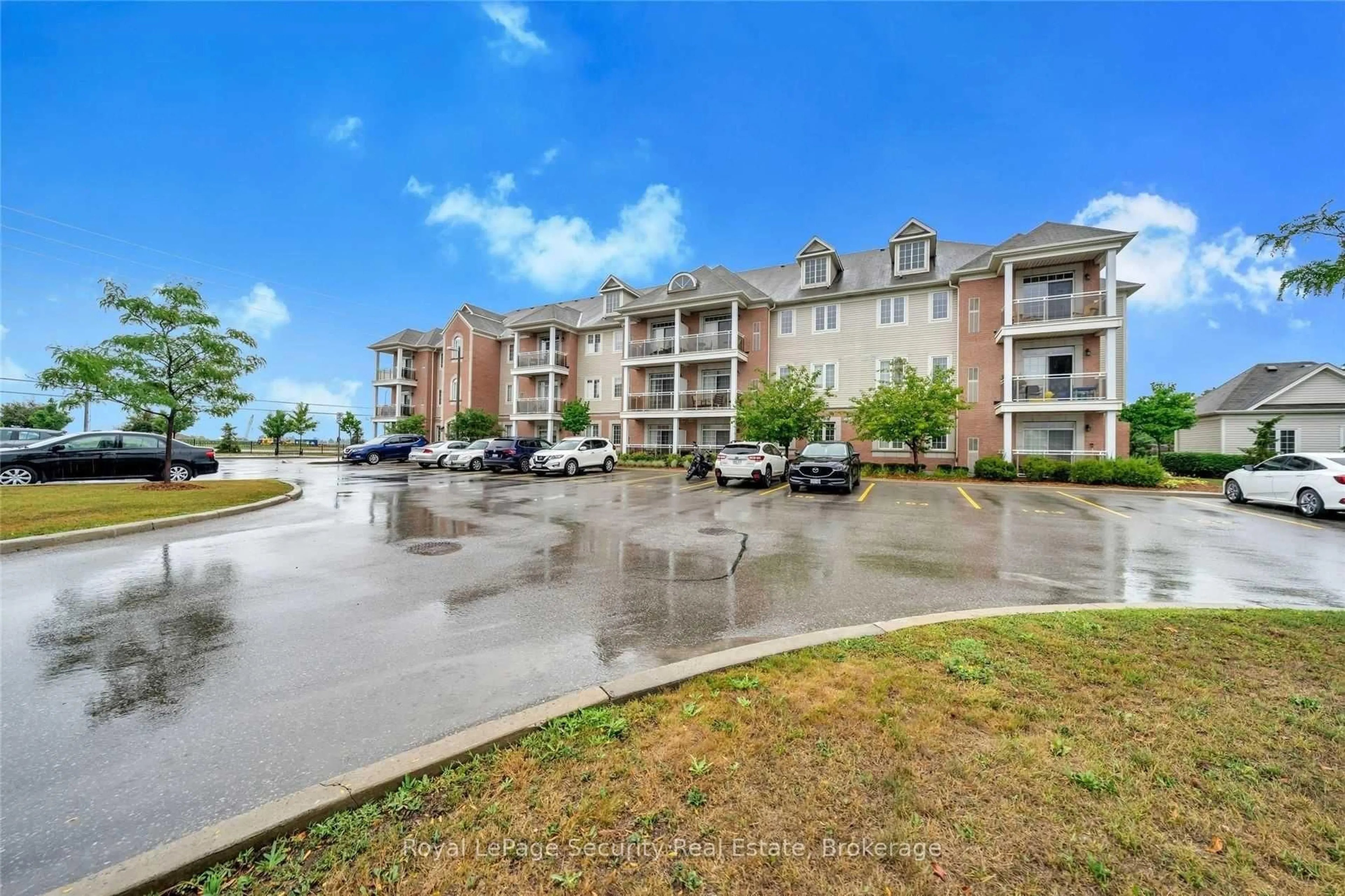 A pic from outside/outdoor area/front of a property/back of a property/a pic from drone, water/lake/river/ocean view for 52 Harvey Johnston Way #101, Whitby Ontario L1M 0J7