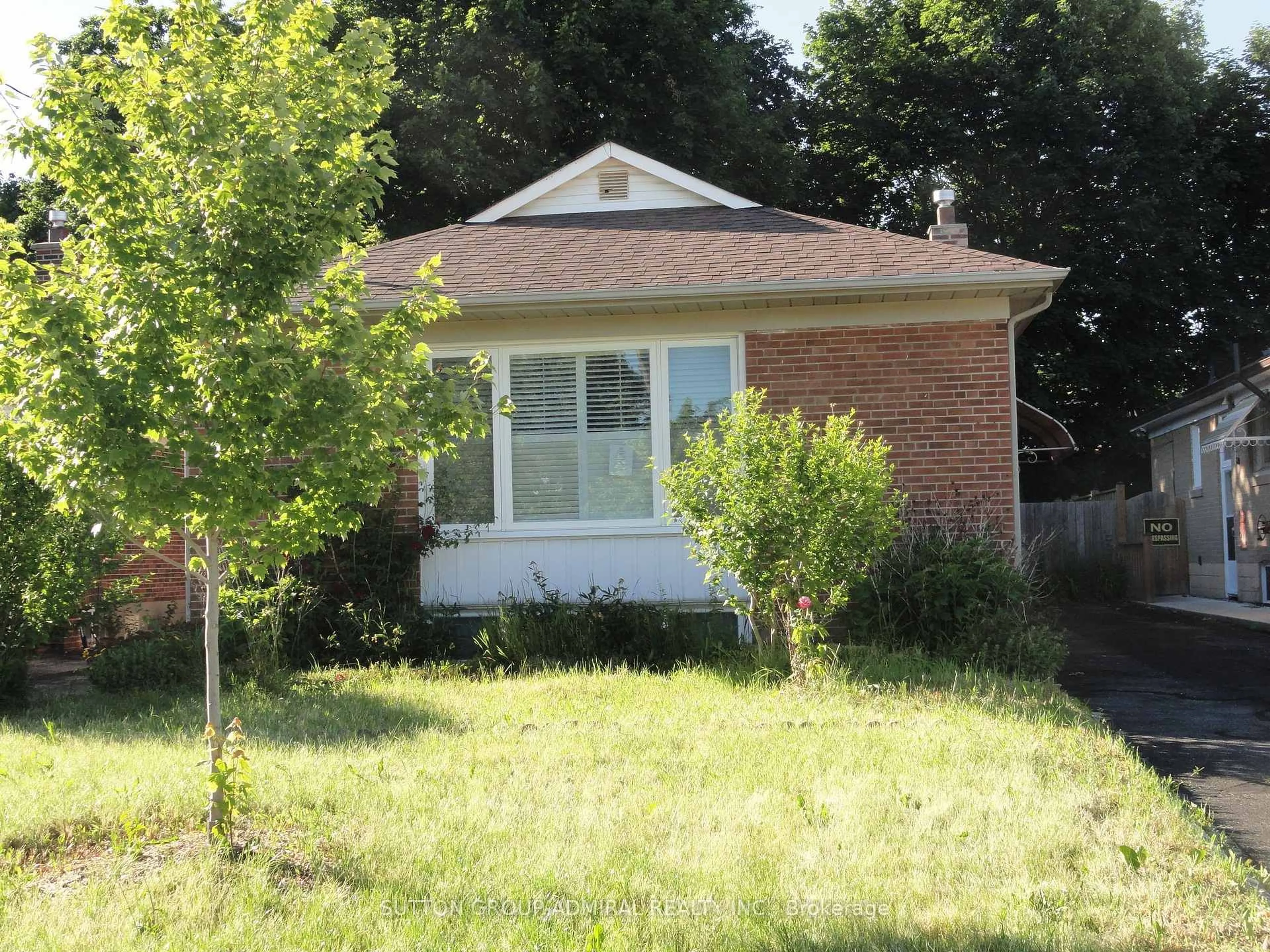 Home with brick exterior material, street for 30 Merrian Rd, Toronto Ontario M1K 3M7