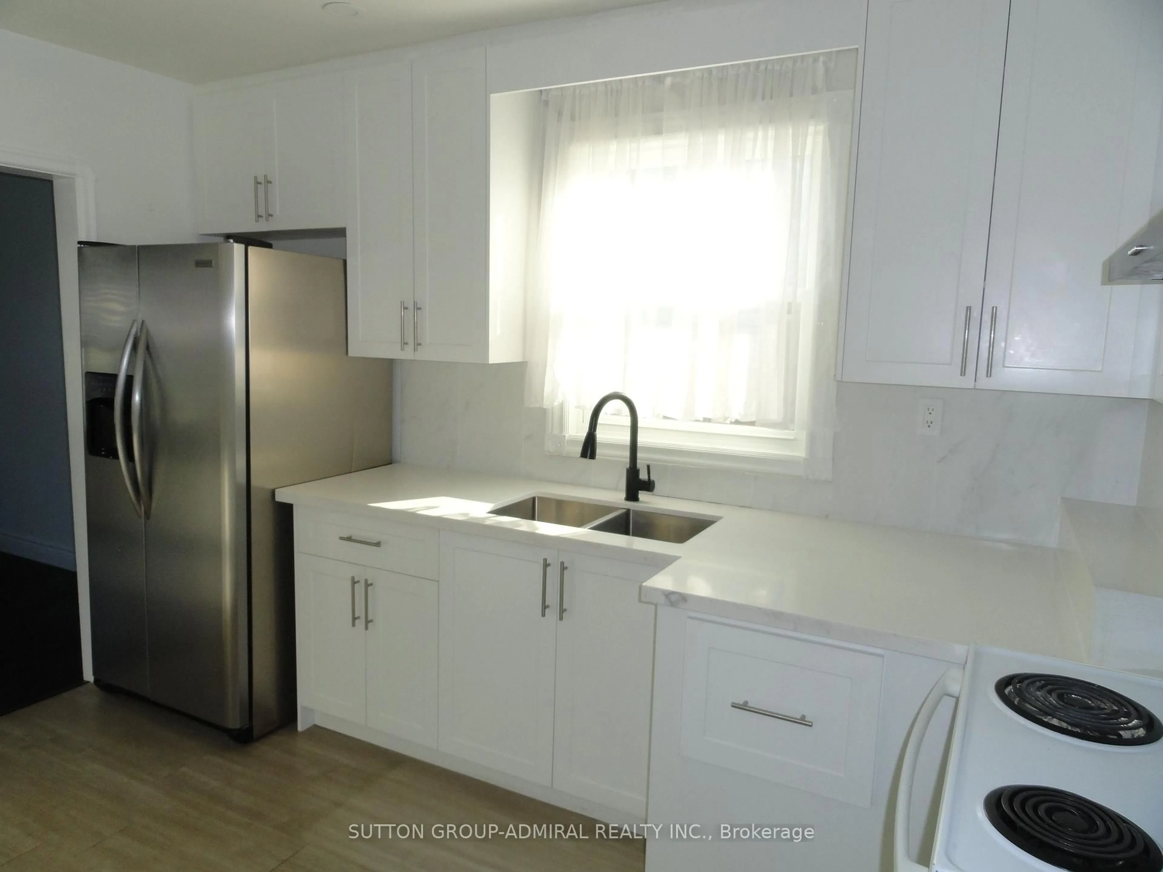 Standard kitchen, unknown for 30 Merrian Rd, Toronto Ontario M1K 3M7
