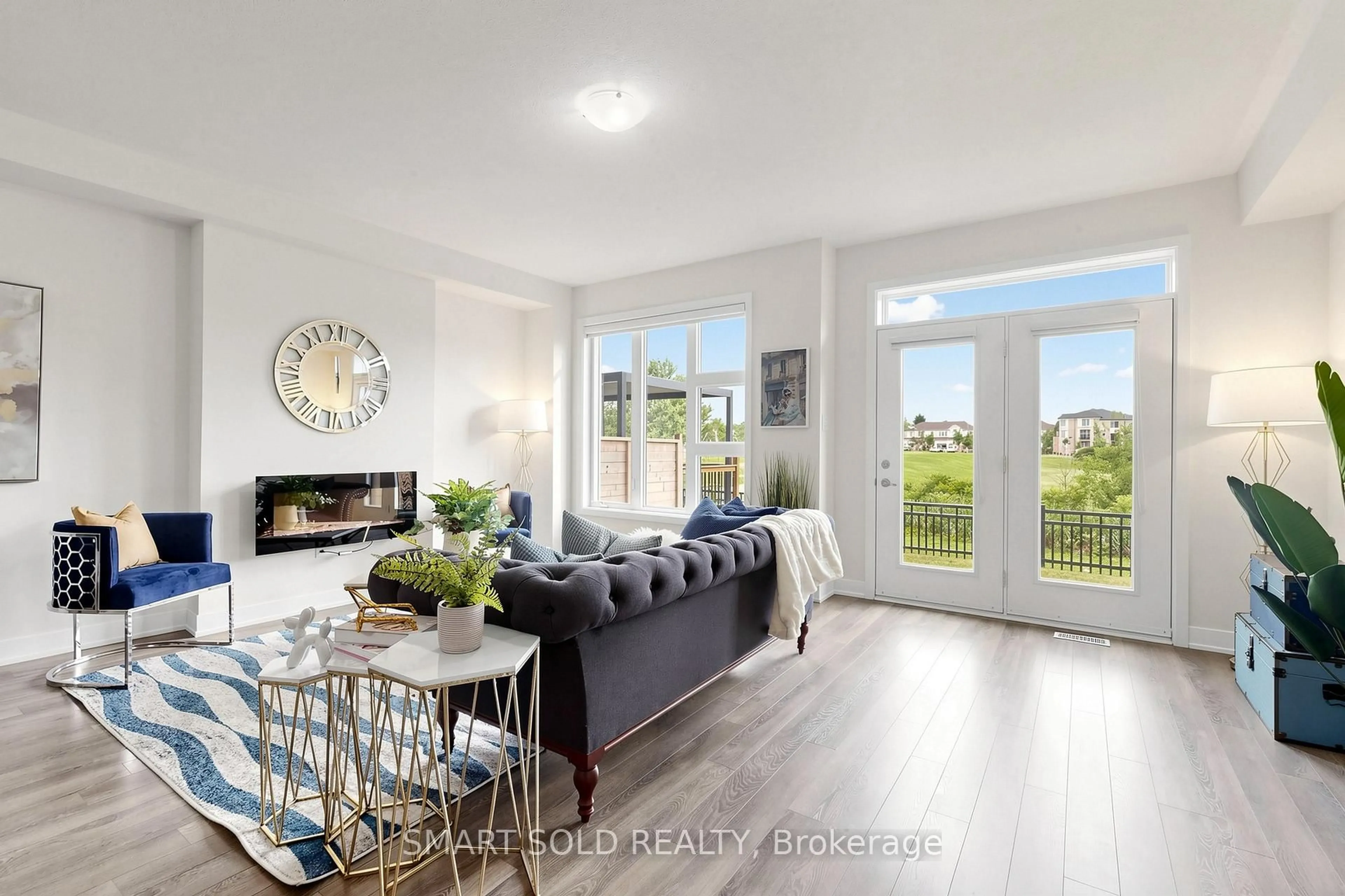 Living room with furniture, wood/laminate floor for 80 Donald Fleming Way, Whitby Ontario L1R 0N8