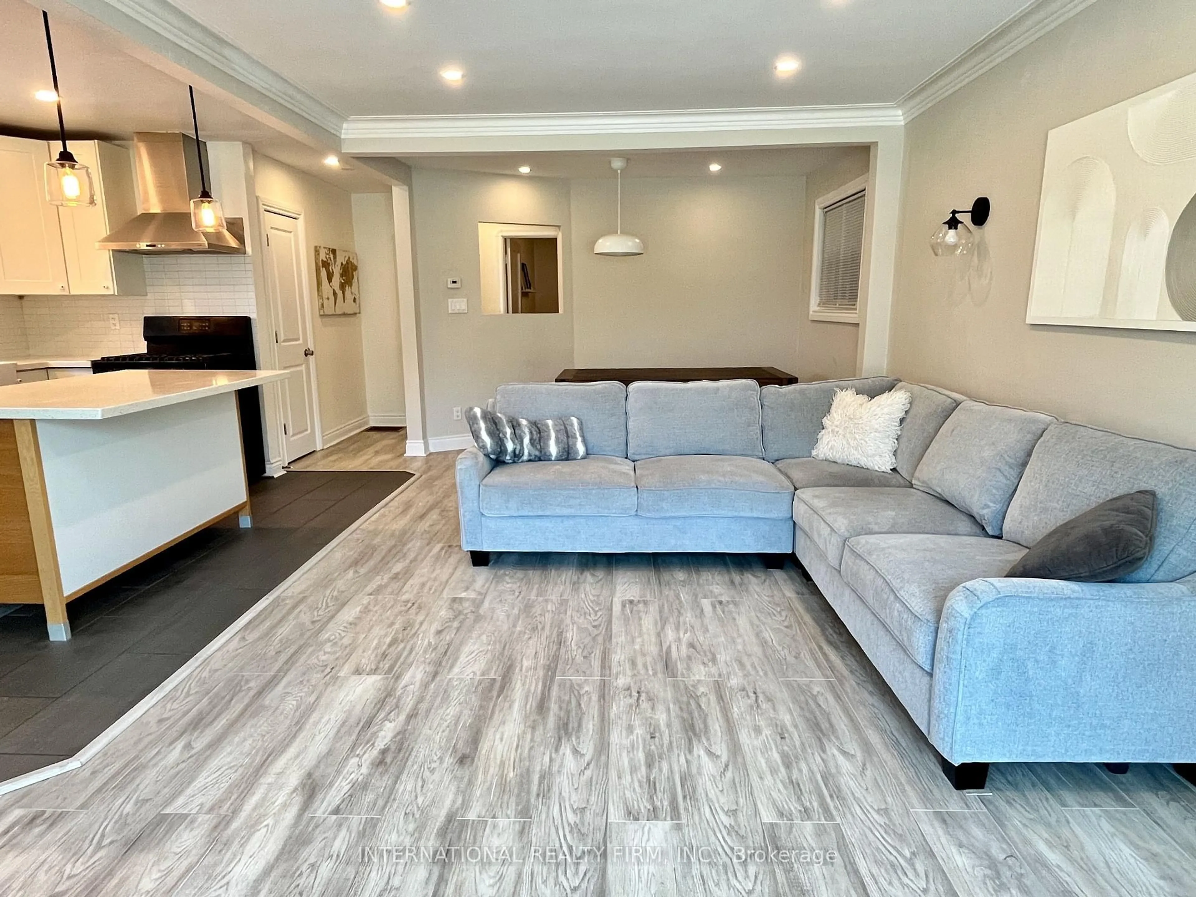 Living room with furniture, unknown for 688 Sammon Ave, Toronto Ontario M4C 2E4