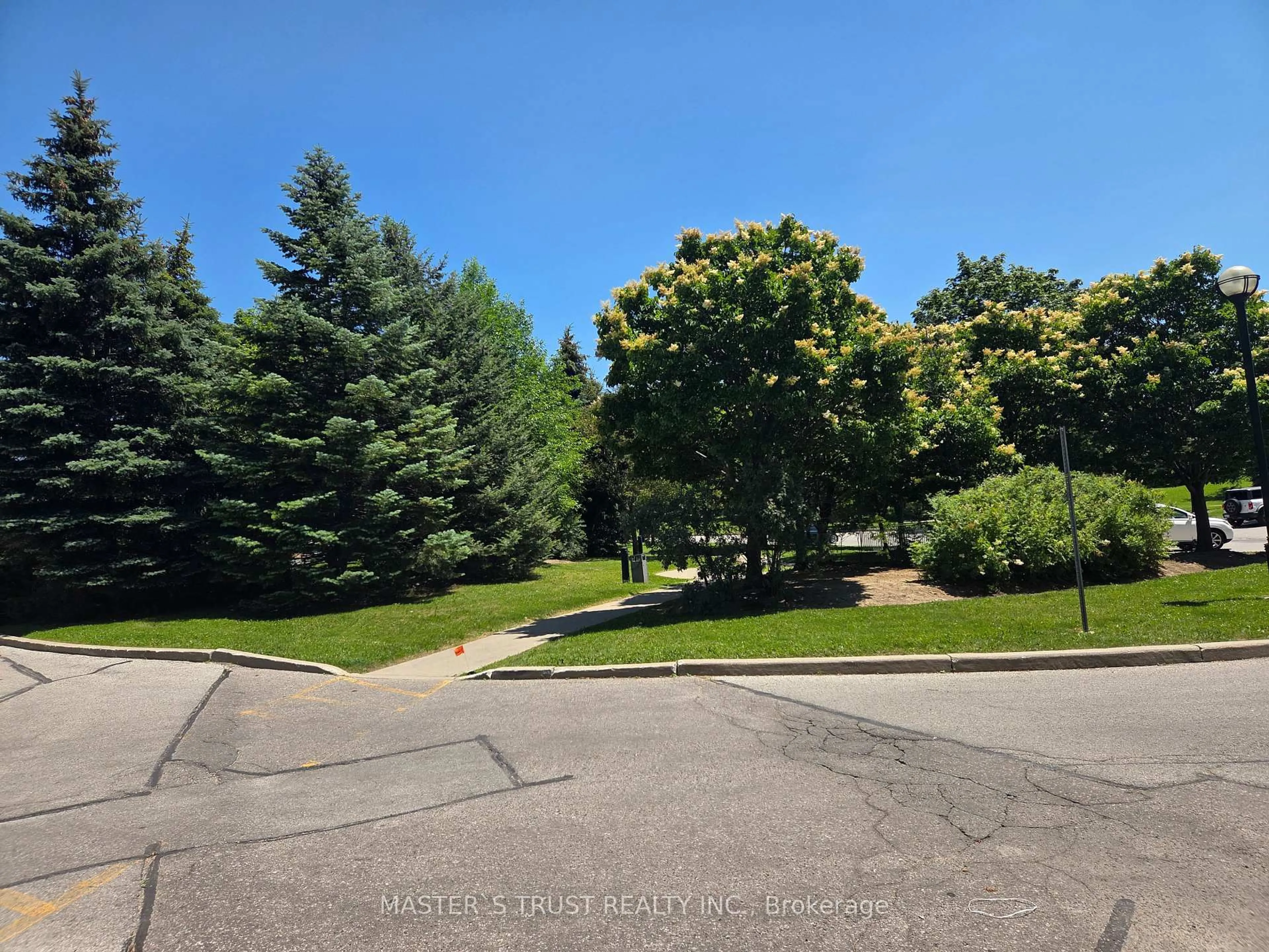 A pic from outside/outdoor area/front of a property/back of a property/a pic from drone, forest/trees view for 2627 Mccowan Rd #1007, Toronto Ontario M1S 5T1