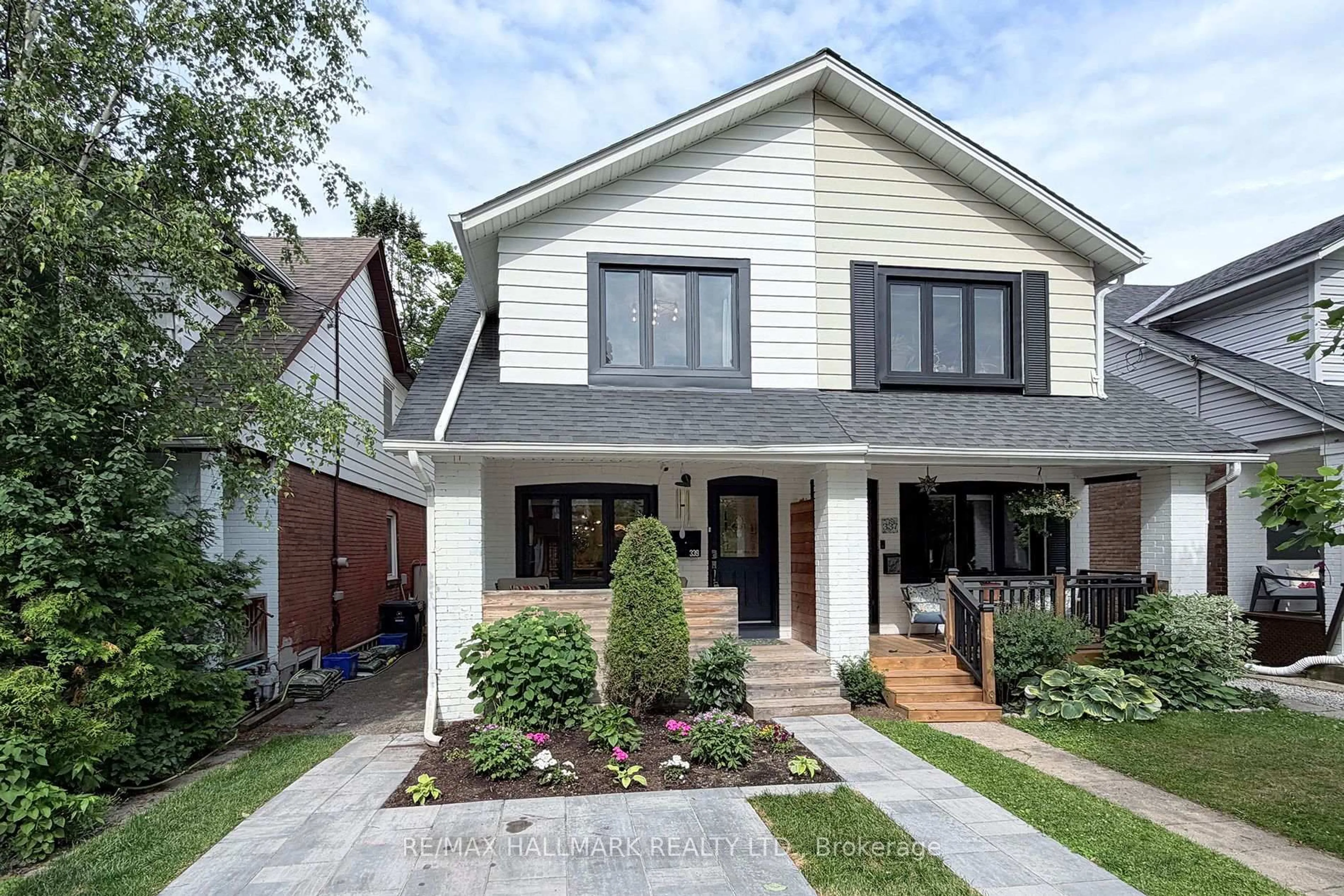 Home with brick exterior material, street for 339 Scarborough Rd, Toronto Ontario M4E 3M9