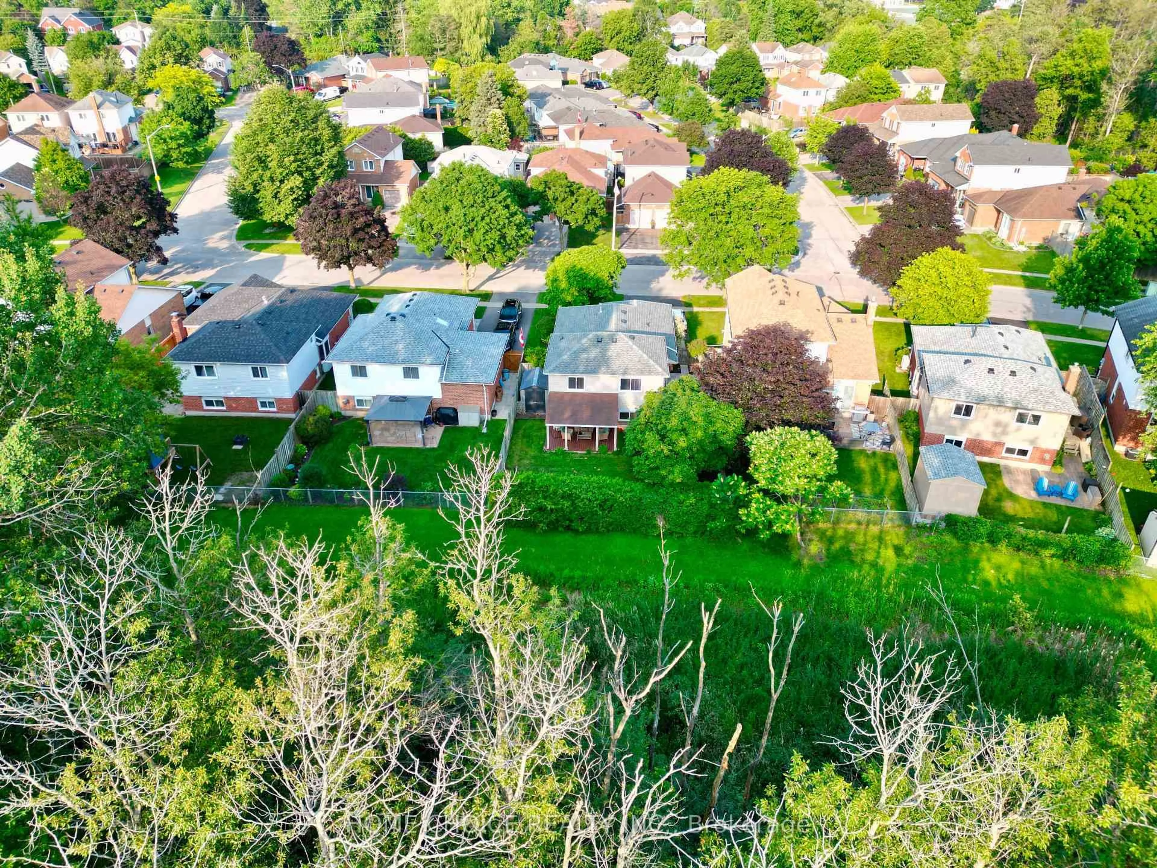 A pic from outside/outdoor area/front of a property/back of a property/a pic from drone, street for 34 Goldpine Ave, Clarington Ontario L1E 1P2