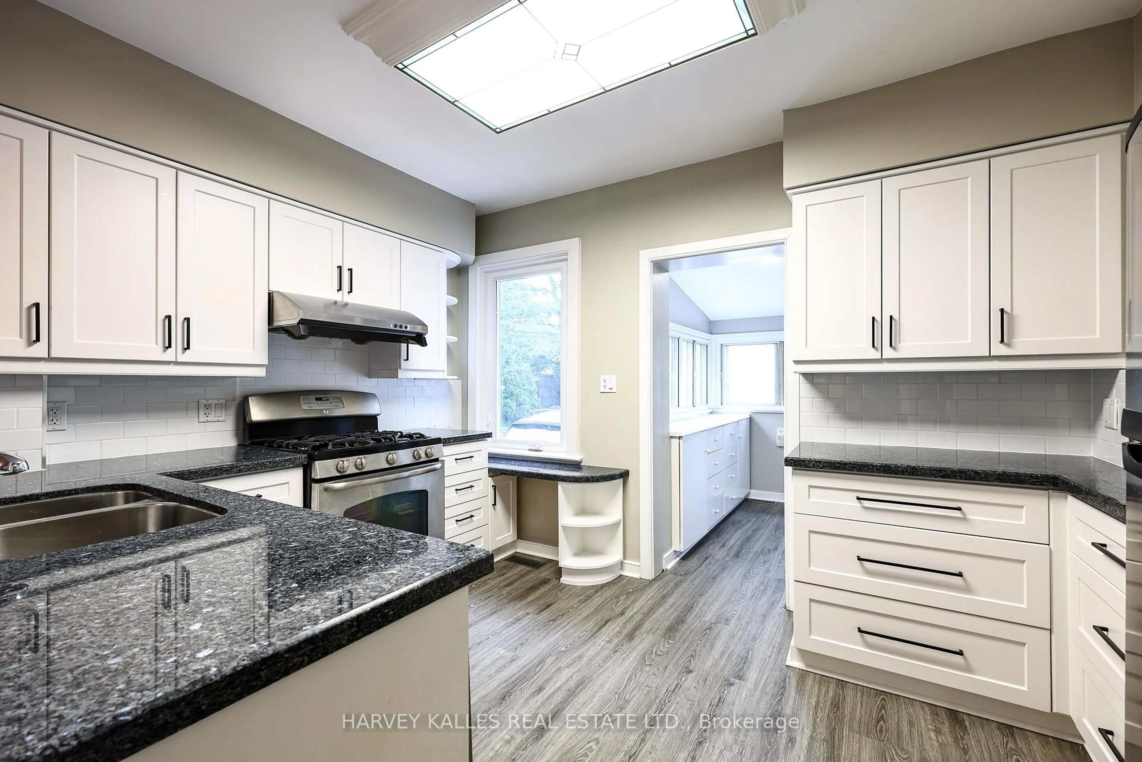 Open concept kitchen, ceramic/tile floor for 638 Milverton Blvd, Toronto Ontario M4C 1X7