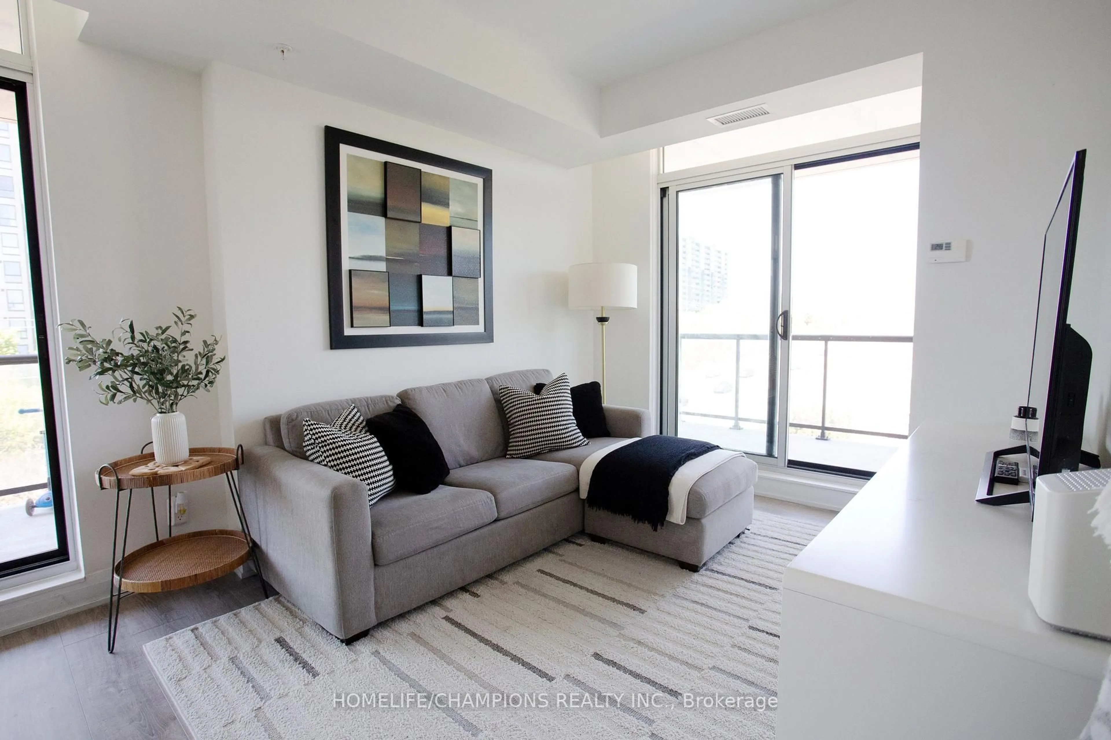 Living room with furniture, unknown for 3655 Kingston Rd #610, Toronto Ontario M1M 1S2