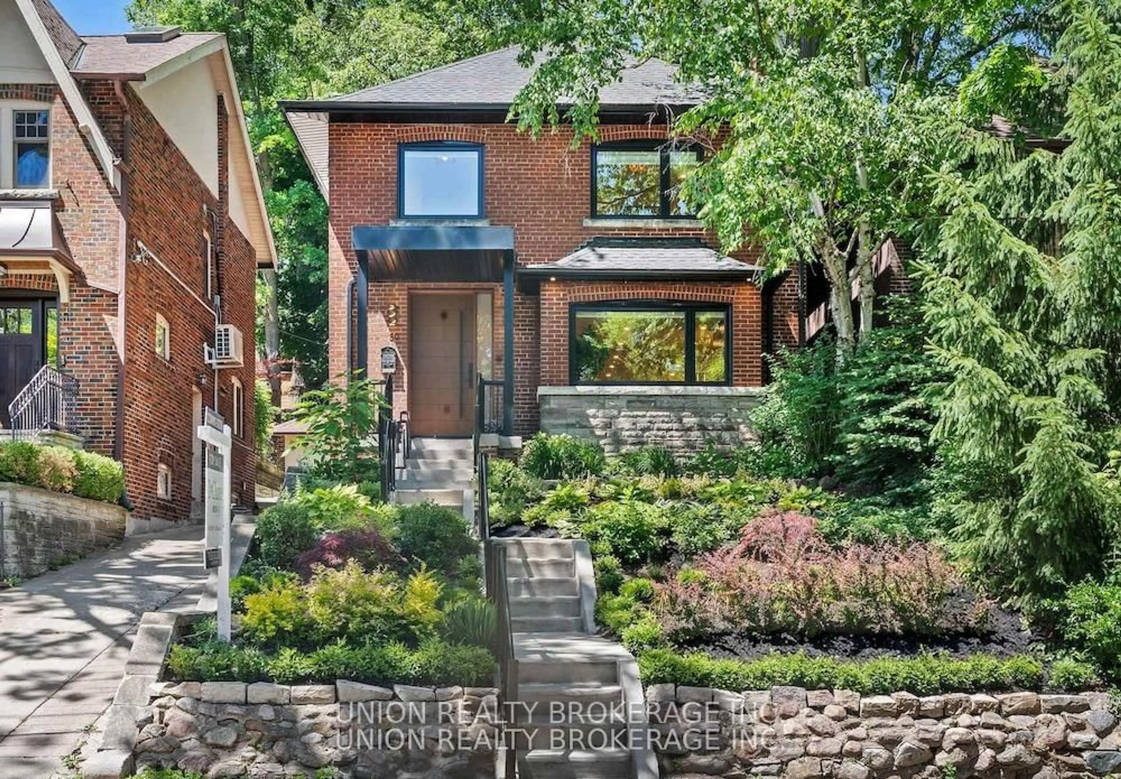 Home with brick exterior material, street for 50 Beaufort Rd, Toronto Ontario M4E 1M7