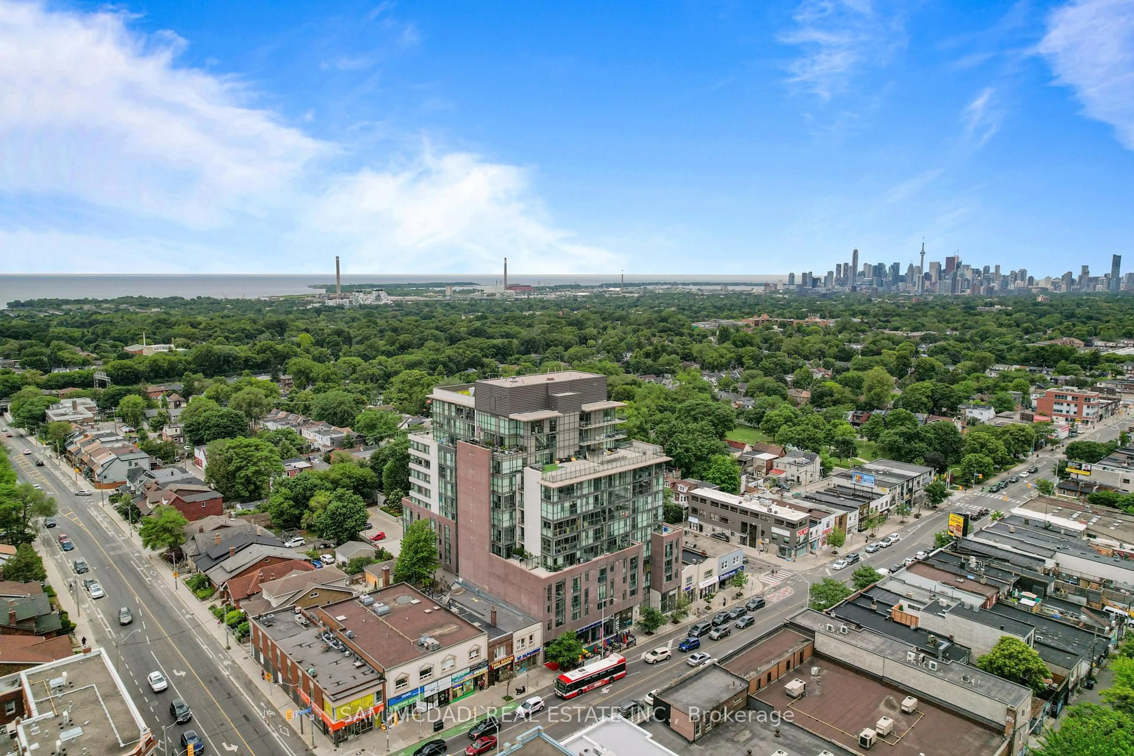 A pic from outside/outdoor area/front of a property/back of a property/a pic from drone, city buildings view from balcony for 2055 Danforth Ave #903, Toronto Ontario M4C 1J8
