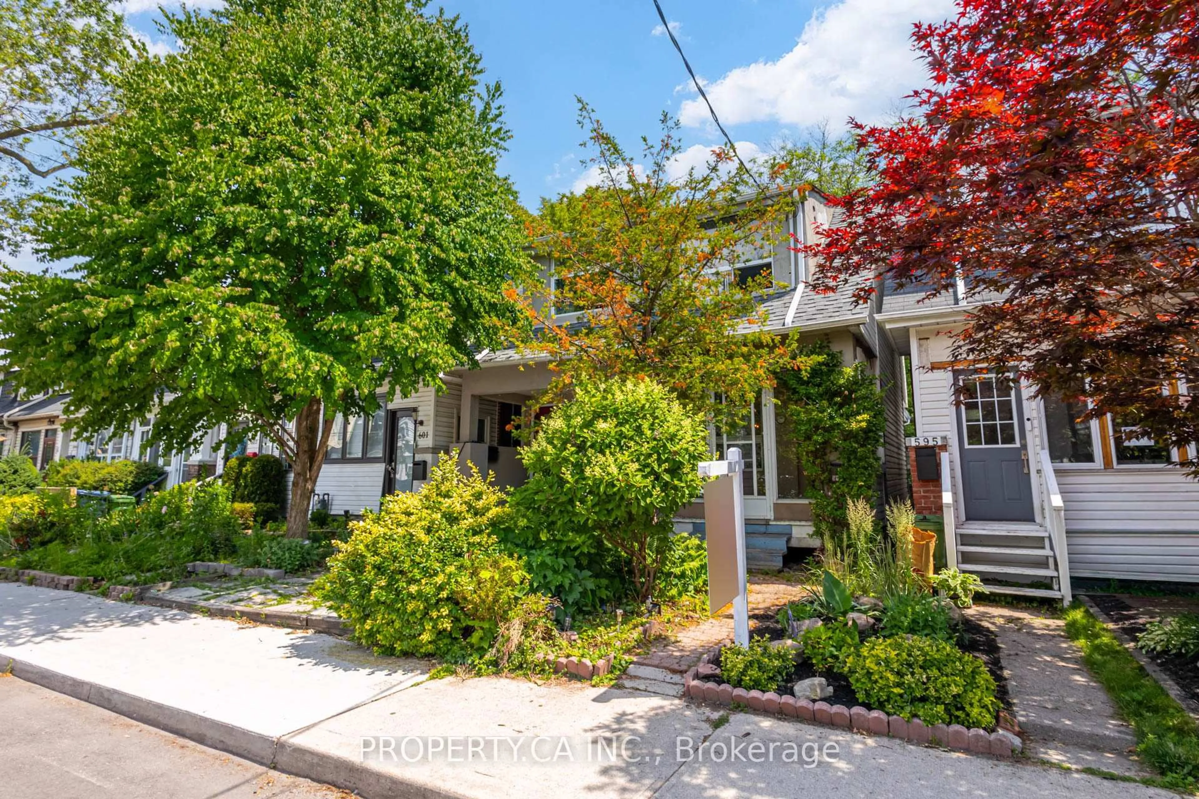 A pic from outside/outdoor area/front of a property/back of a property/a pic from drone, street for 597 Rhodes Ave, Toronto Ontario M4J 4X5