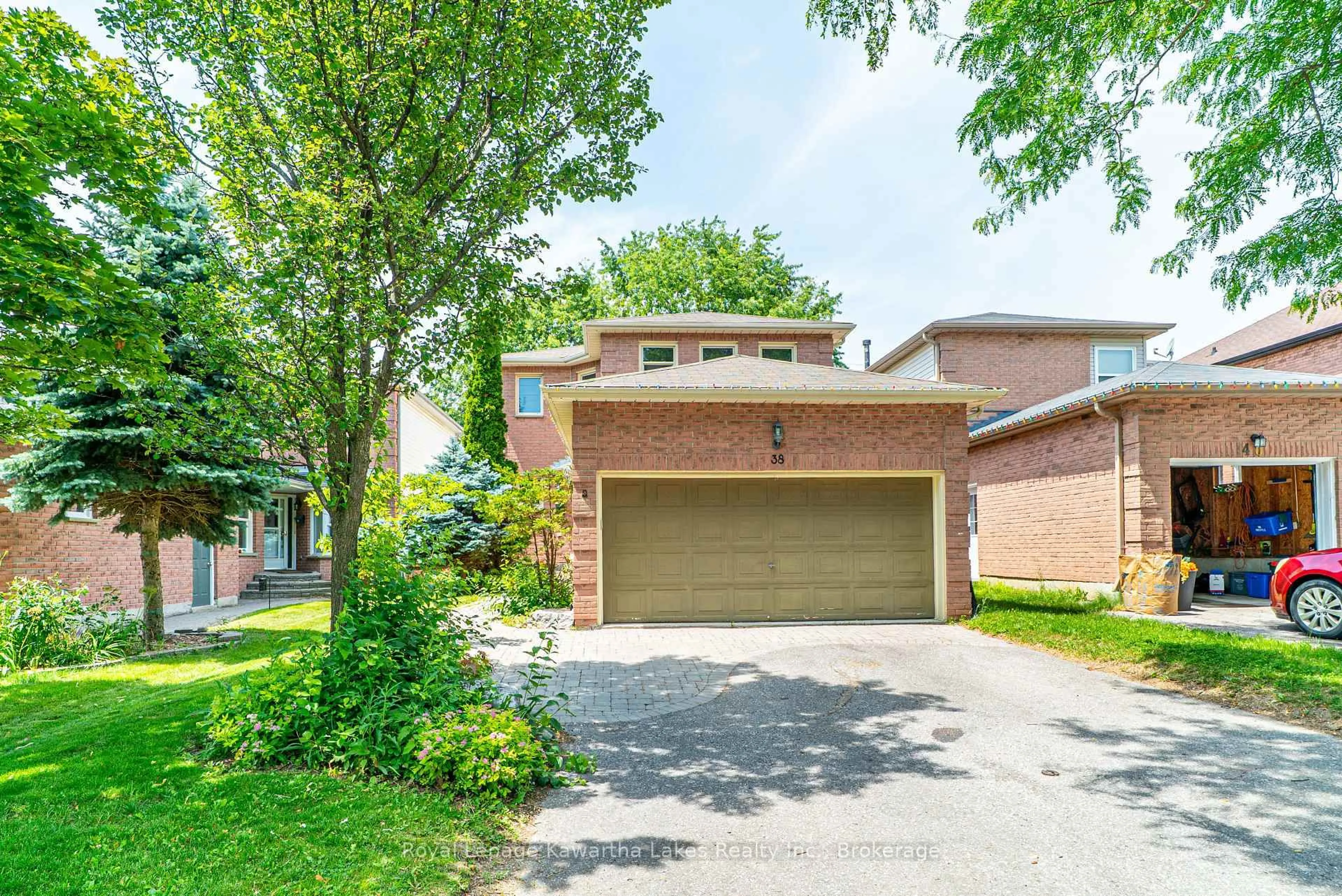 Home with brick exterior material, street for 38 Lipton Cres, Whitby Ontario L1R 1W7