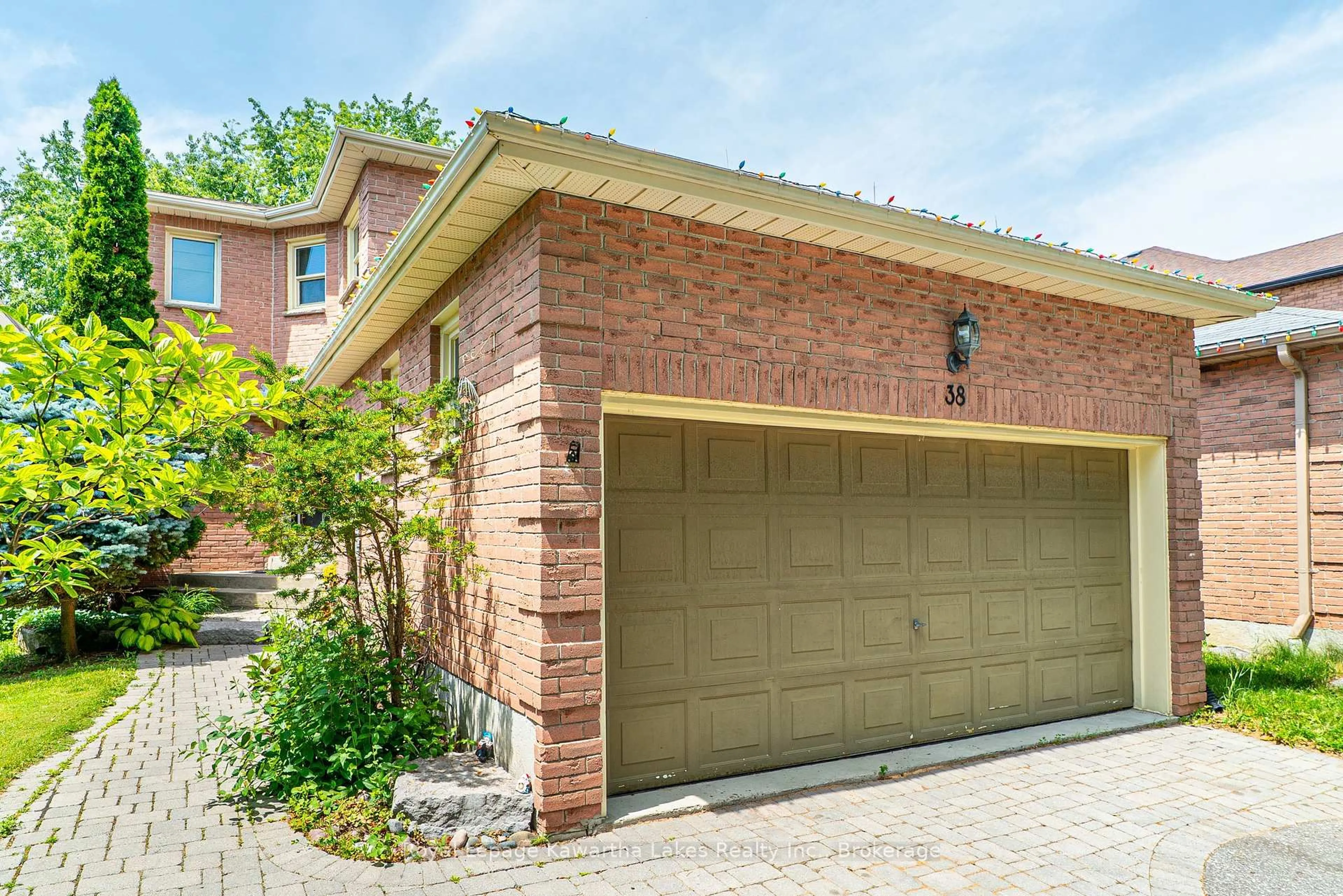 Home with brick exterior material, street for 38 Lipton Cres, Whitby Ontario L1R 1W7