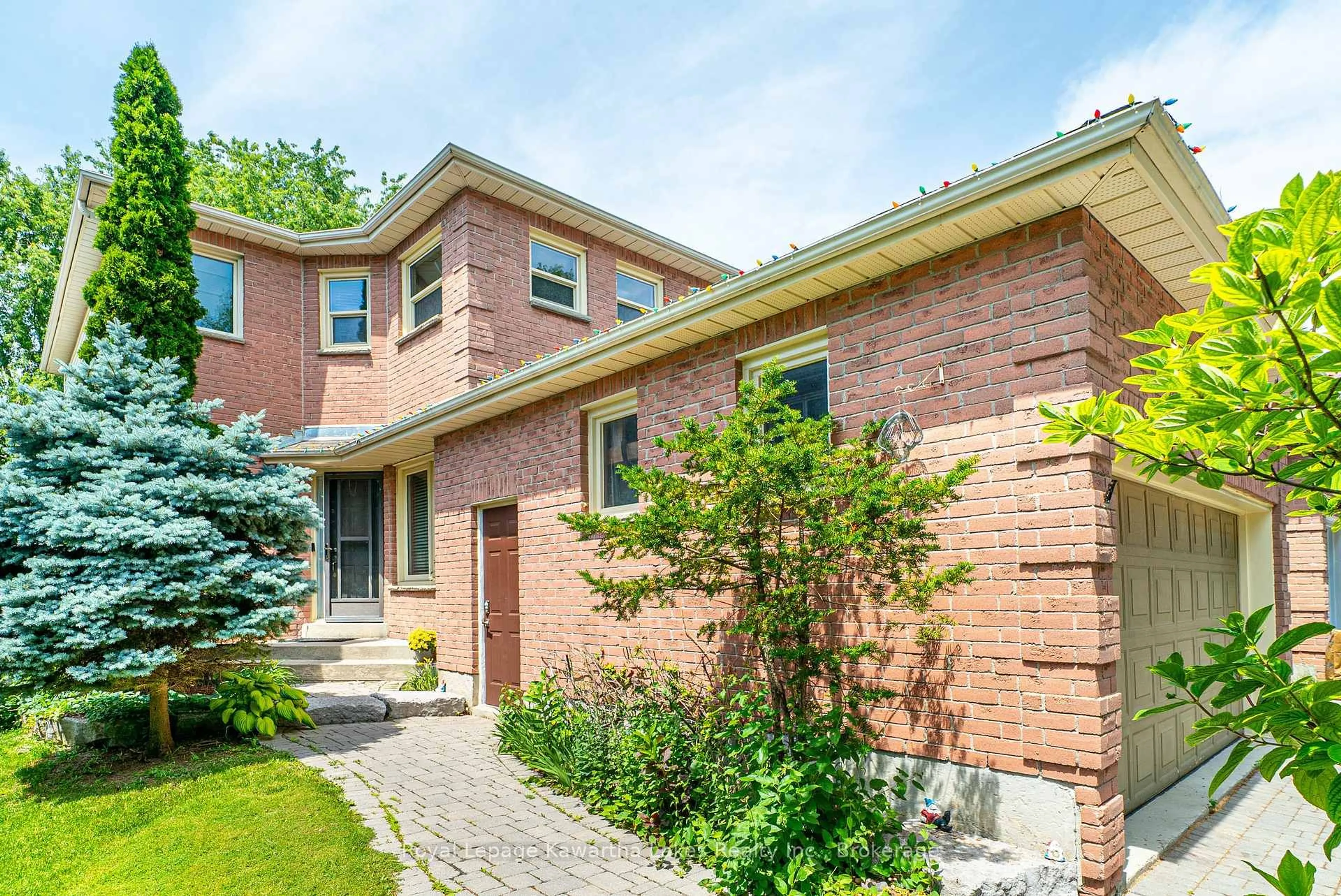 Home with brick exterior material, street for 38 Lipton Cres, Whitby Ontario L1R 1W7