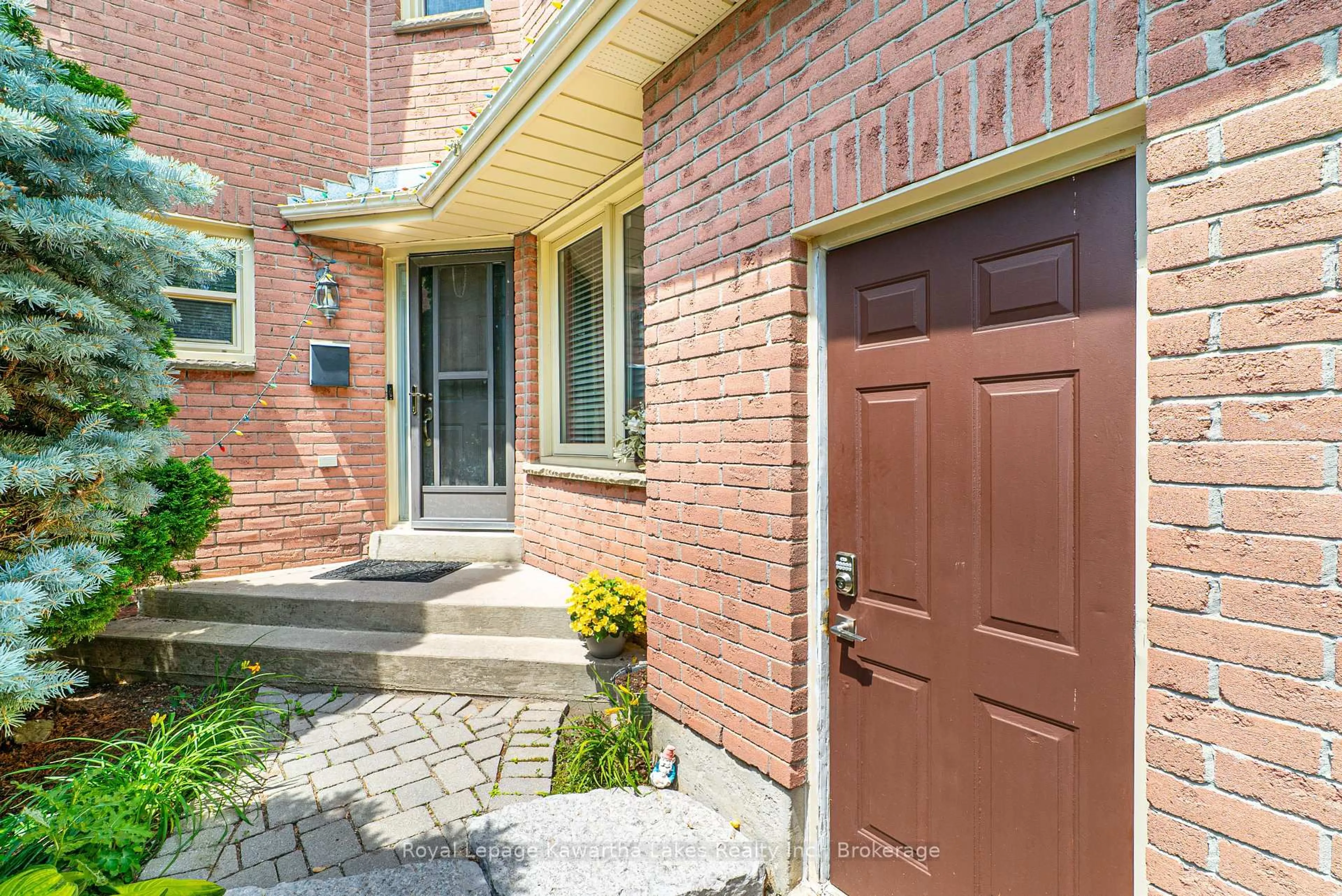Home with brick exterior material, street for 38 Lipton Cres, Whitby Ontario L1R 1W7
