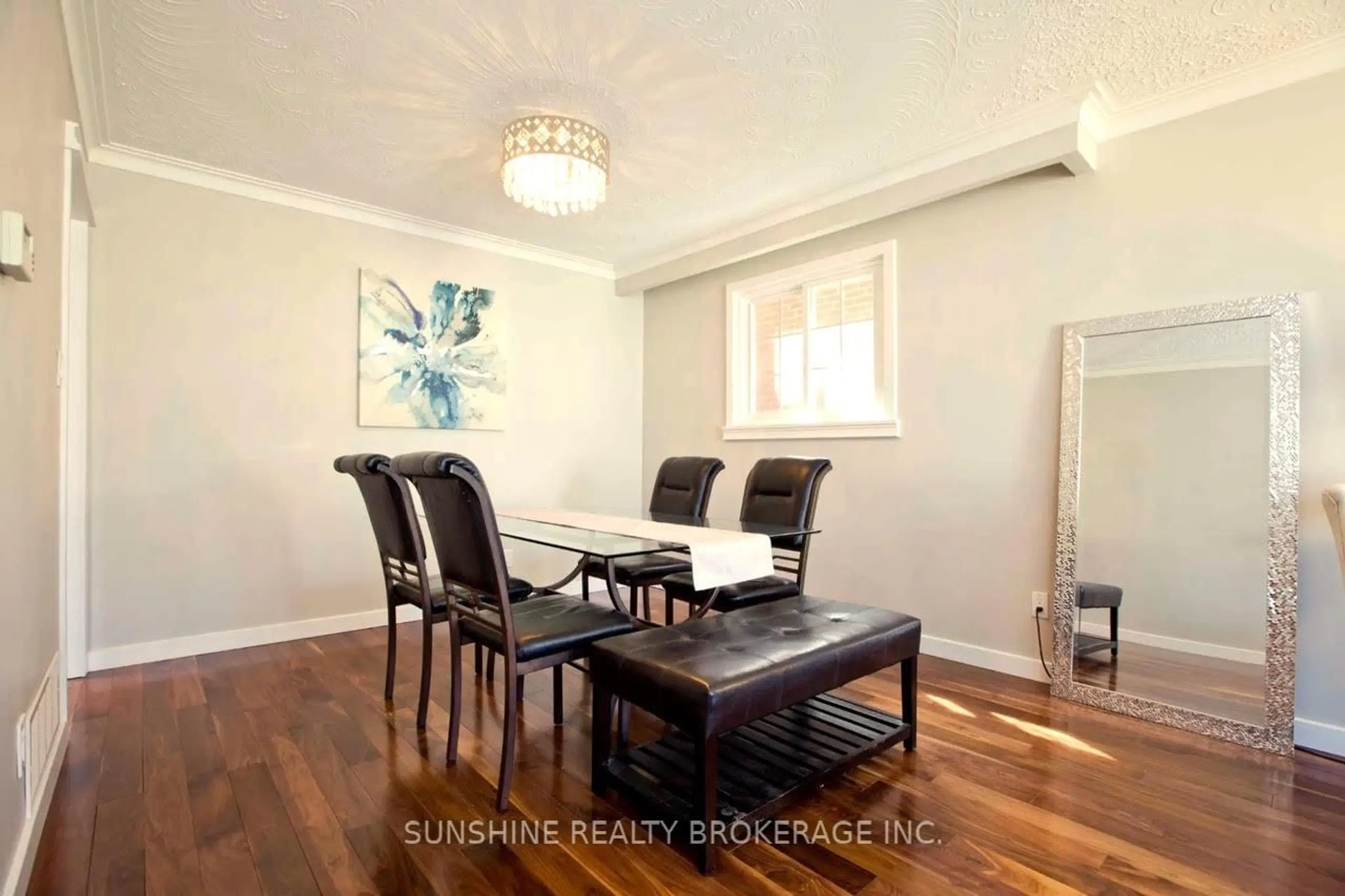 Dining room, wood/laminate floor for 121 Sammon Ave, Toronto Ontario M4J 1Y9