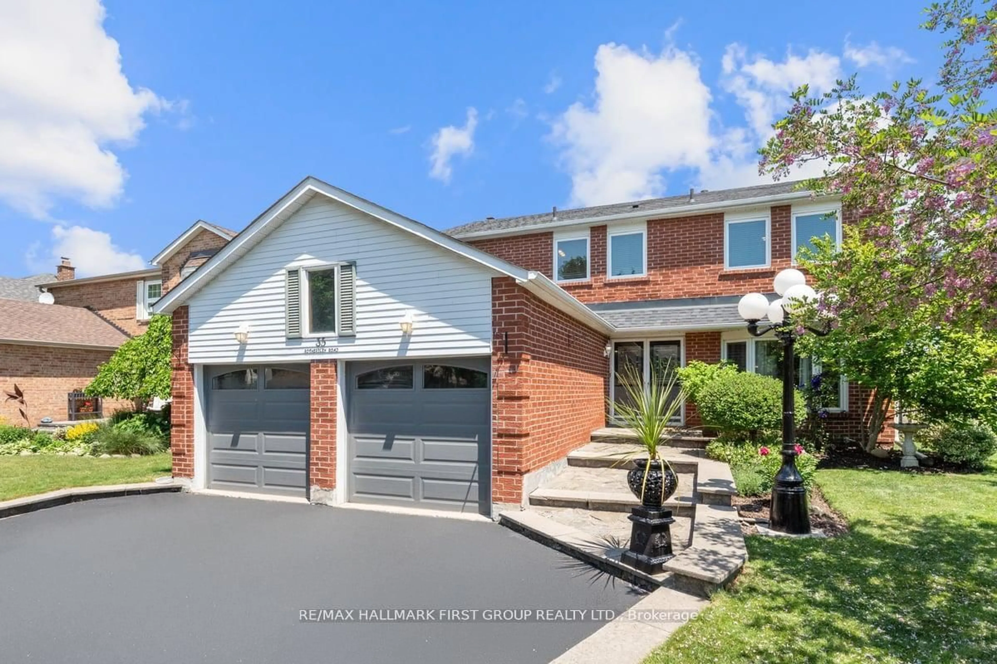 Home with brick exterior material, street for 35 Rotherglen Rd, Ajax Ontario L1S 5K8