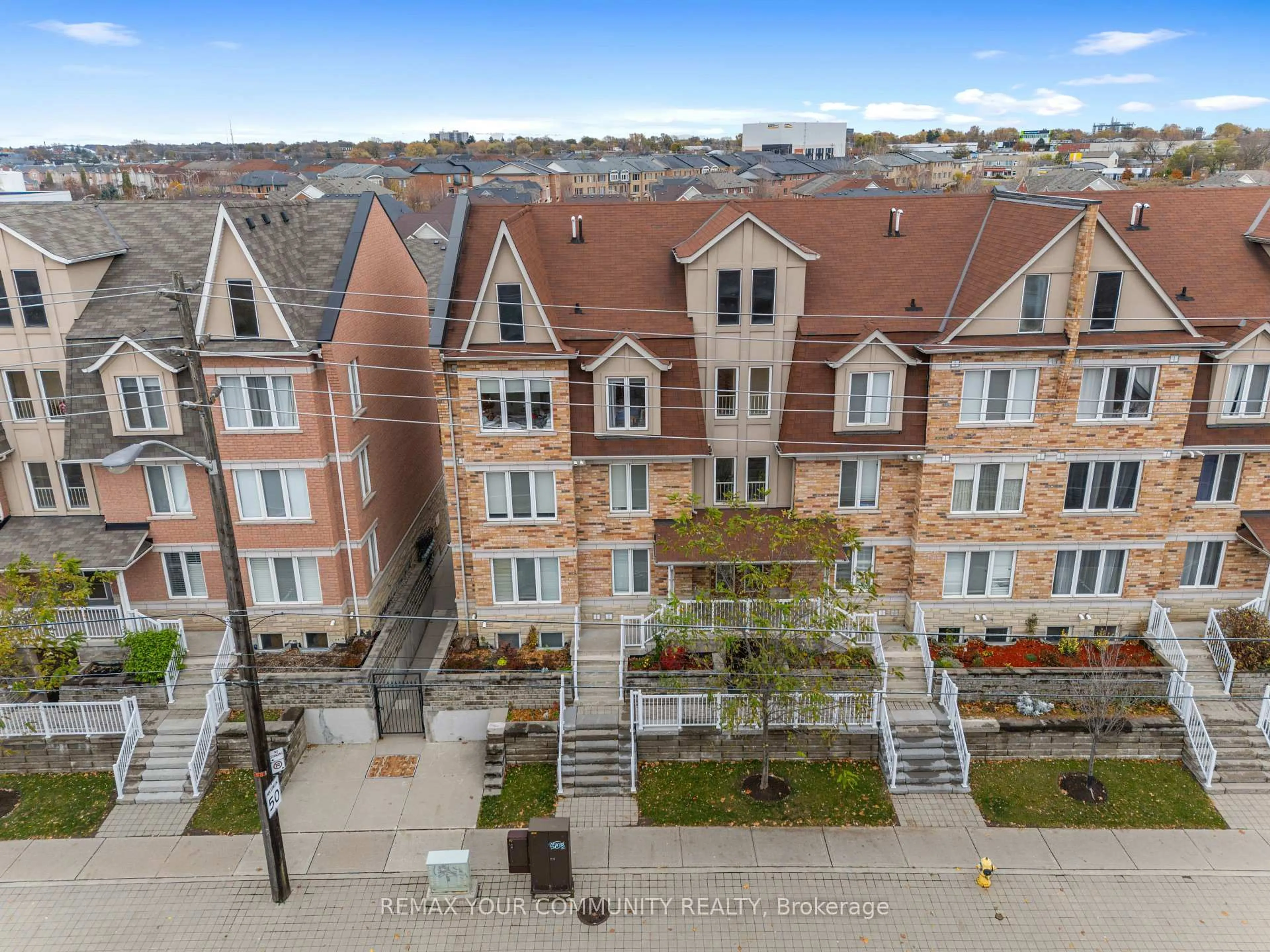 A pic from outside/outdoor area/front of a property/back of a property/a pic from drone, city buildings view from balcony for 651F Warden Ave #48, Toronto Ontario M1L 0E8