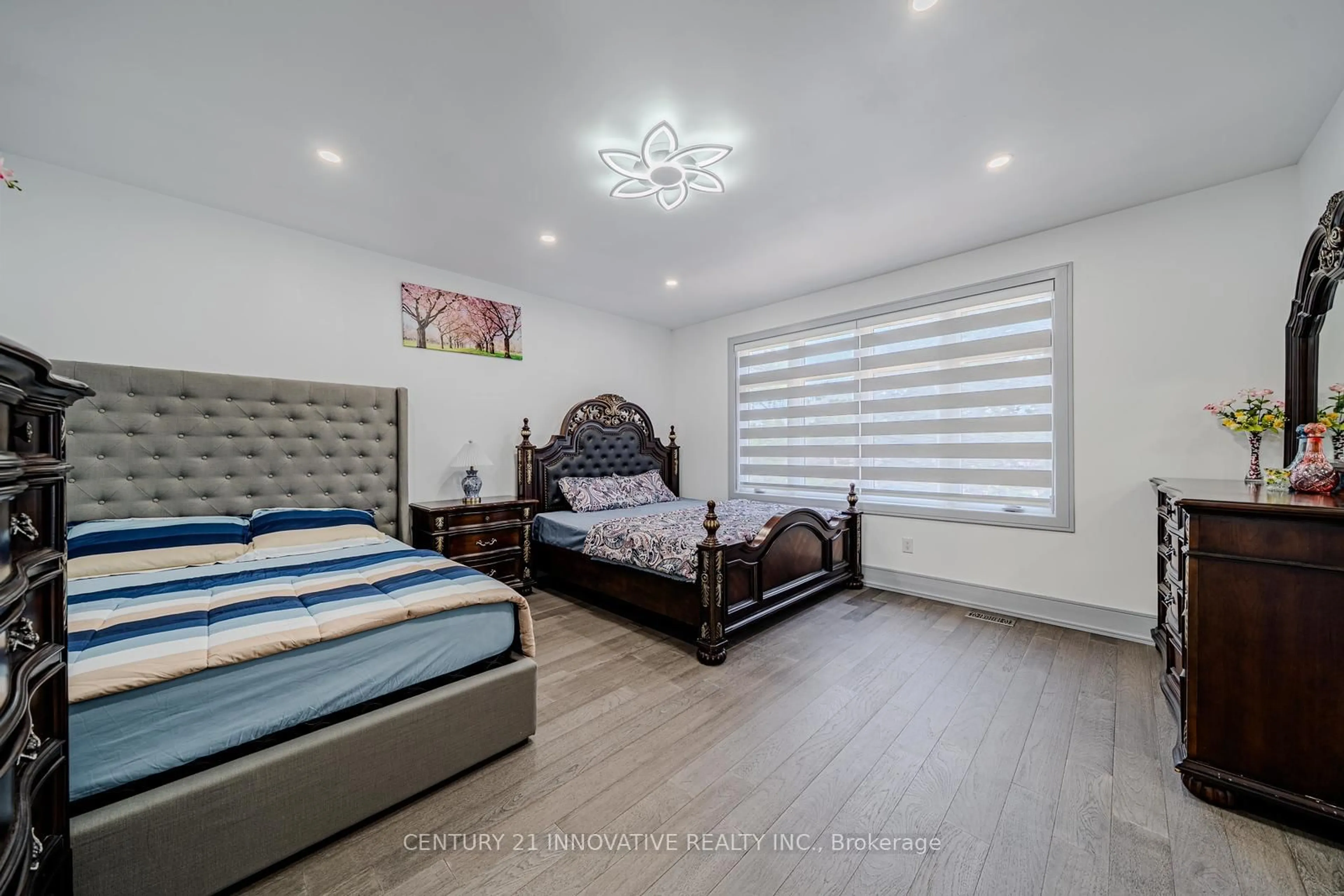 Bedroom with bed, wood/laminate floor for 435 Miller Ave, Oshawa Ontario L1J 2S8