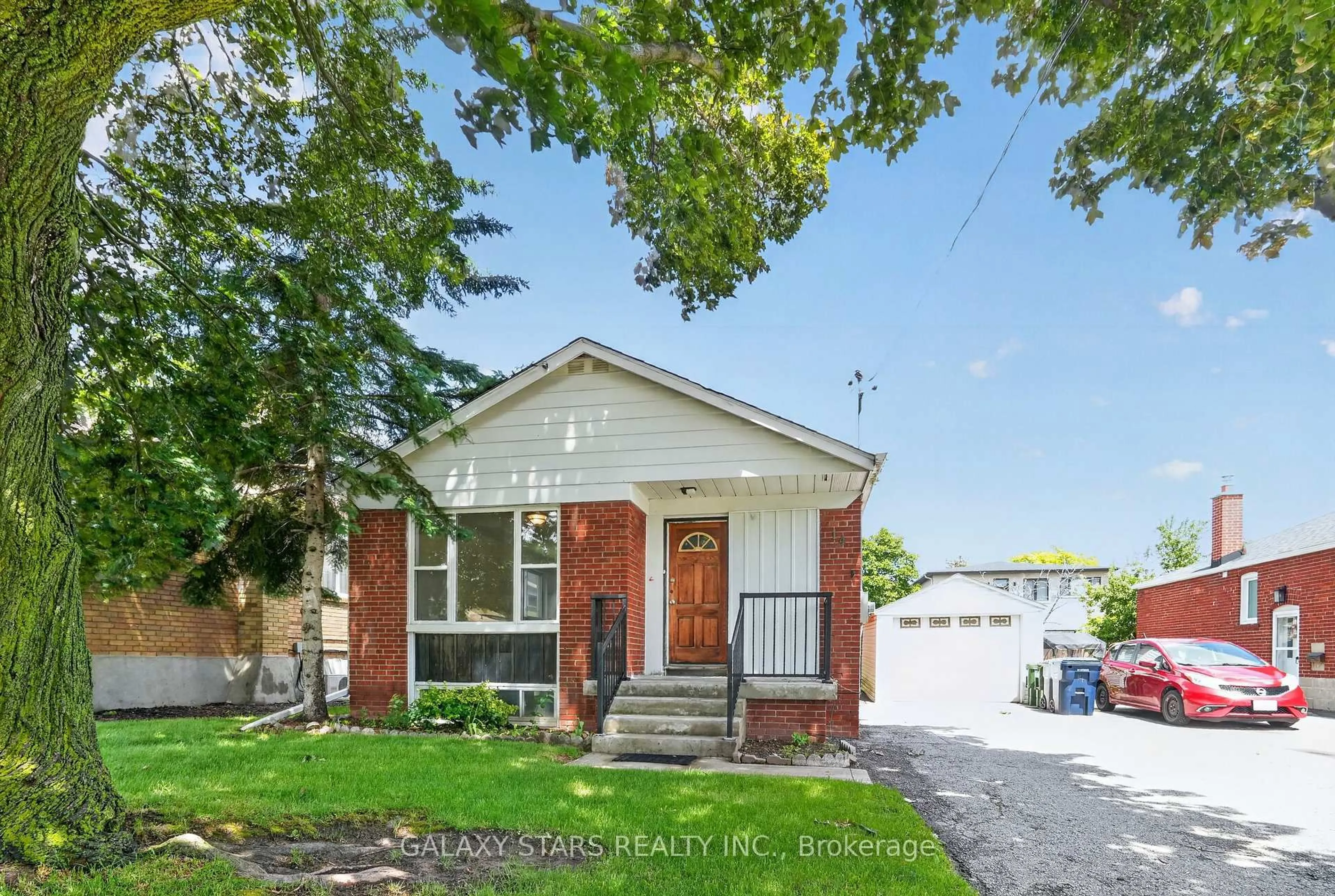 Home with brick exterior material, street for 14 Minford Ave, Toronto Ontario M1R 2B1