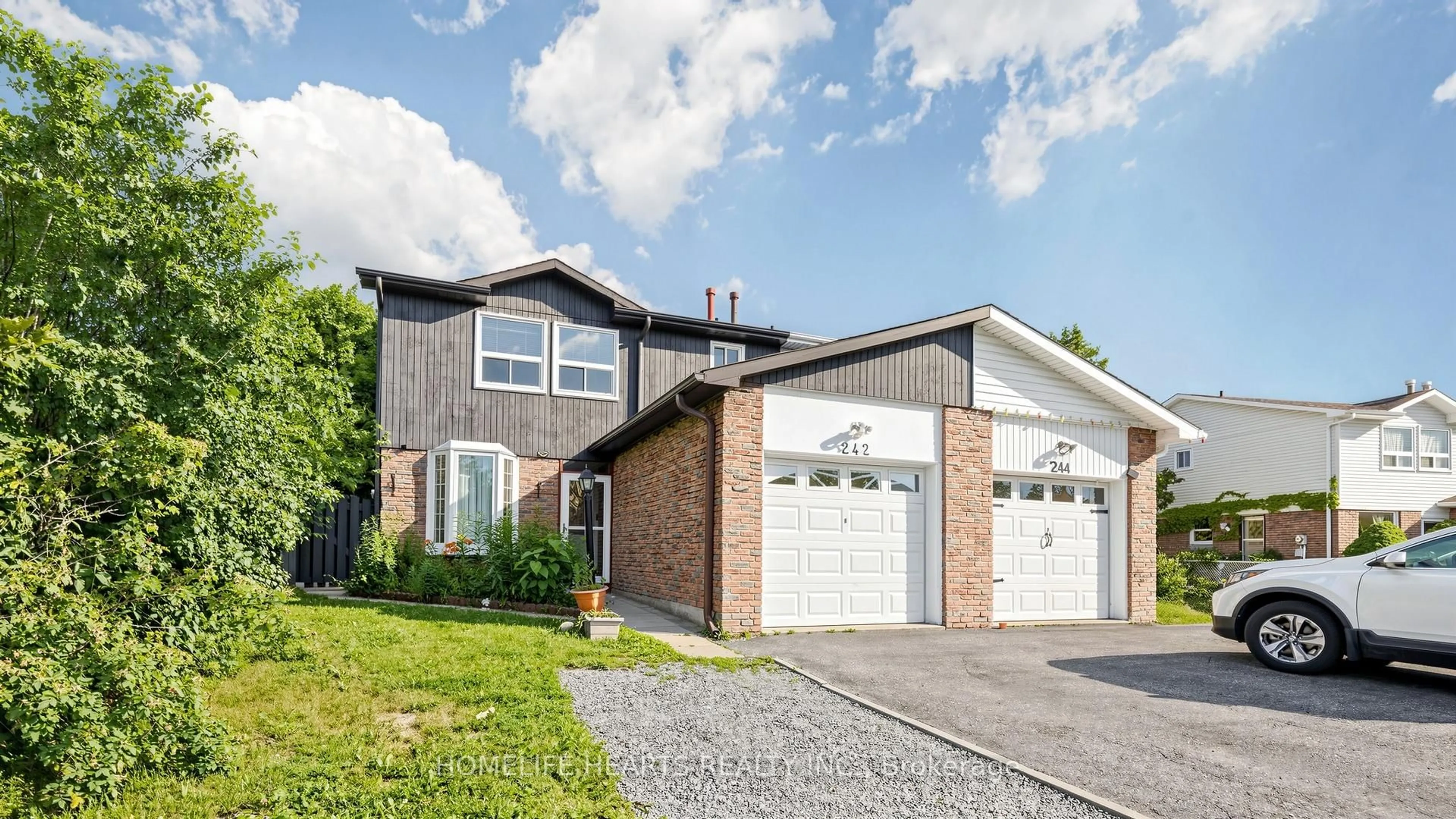 Home with brick exterior material, street for 242 Braymore Blvd, Toronto Ontario M1B 2G8