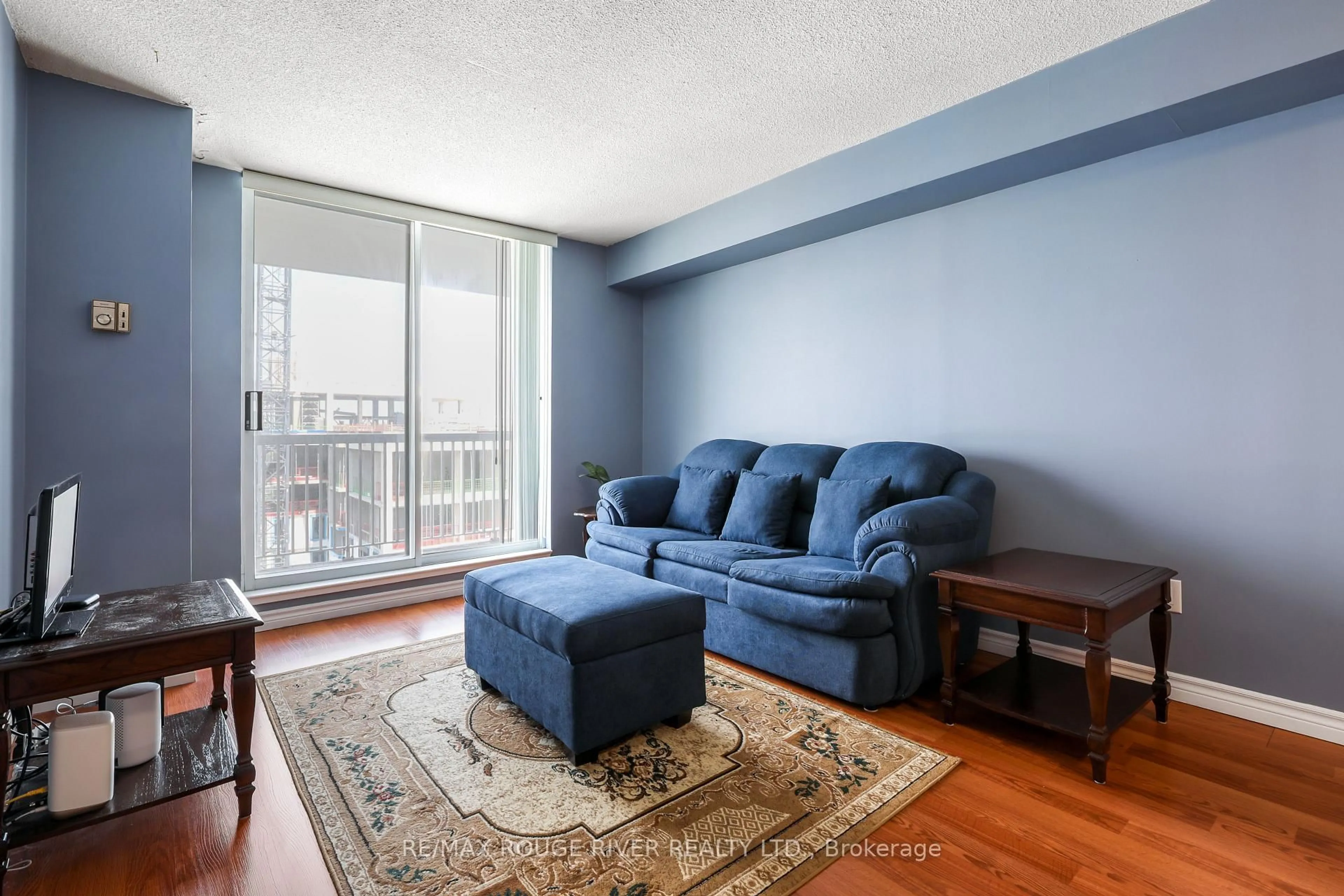 Living room with furniture, unknown for 15 Sewells Rd #1005, Toronto Ontario M1B 3V7