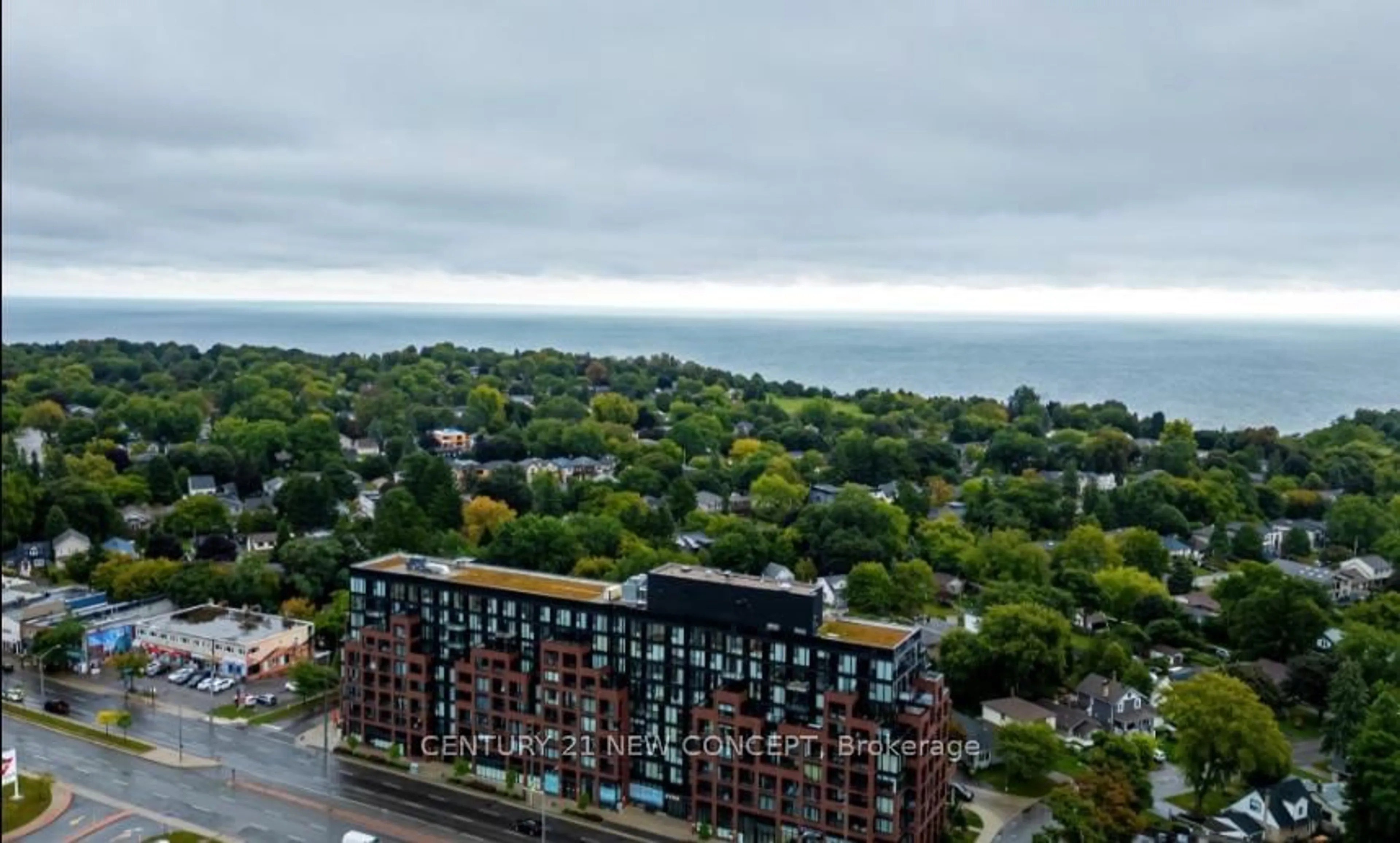 A pic from outside/outdoor area/front of a property/back of a property/a pic from drone, city buildings view from balcony for 2799 Kingston Rd #301, Toronto Ontario M1M 0E3