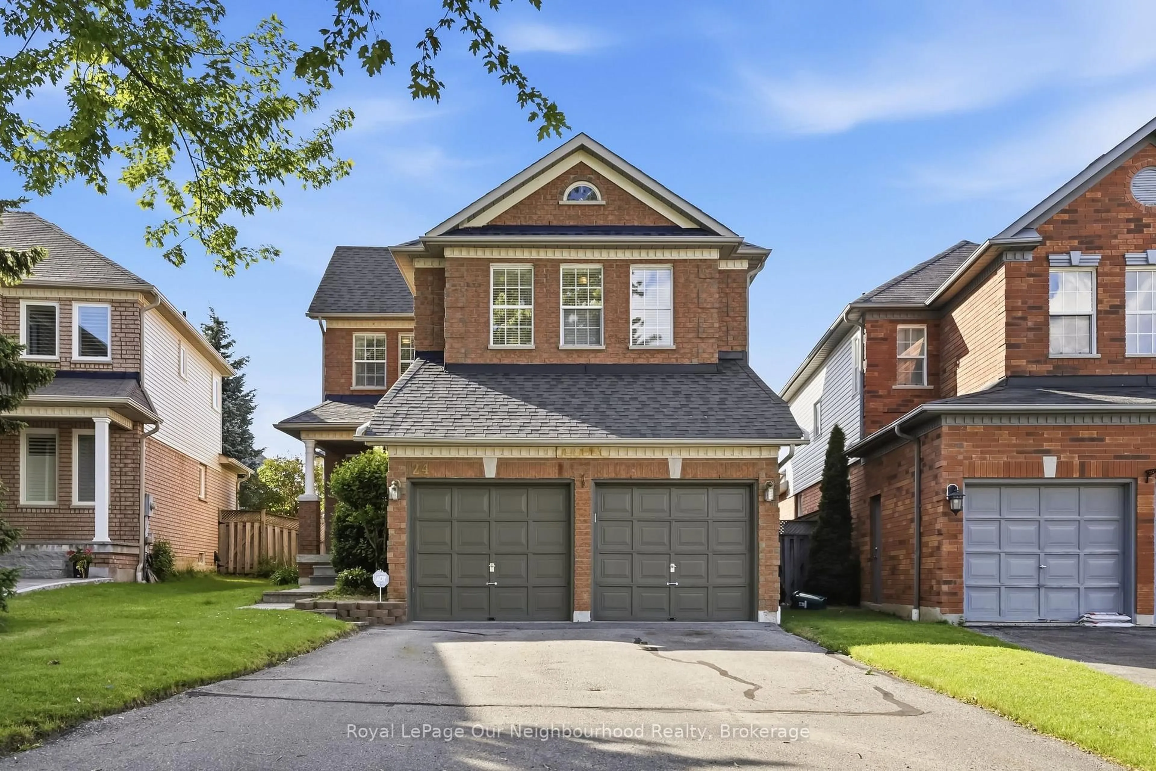 Home with brick exterior material, street for 24 Wetherburn Dr, Whitby Ontario L1P 1M7