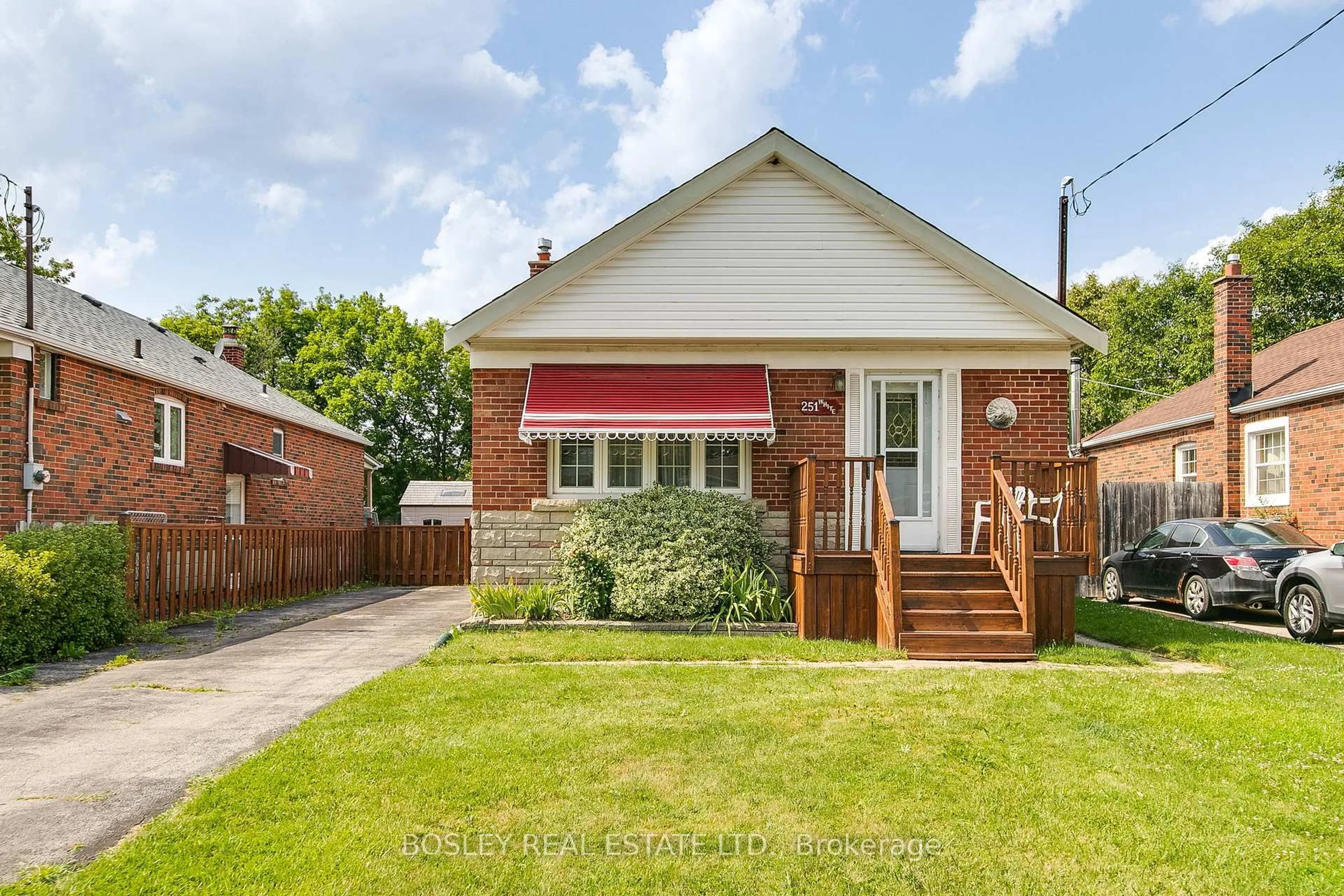 Home with brick exterior material, street for 251 Ellington Dr, Toronto Ontario M1R 3Y2