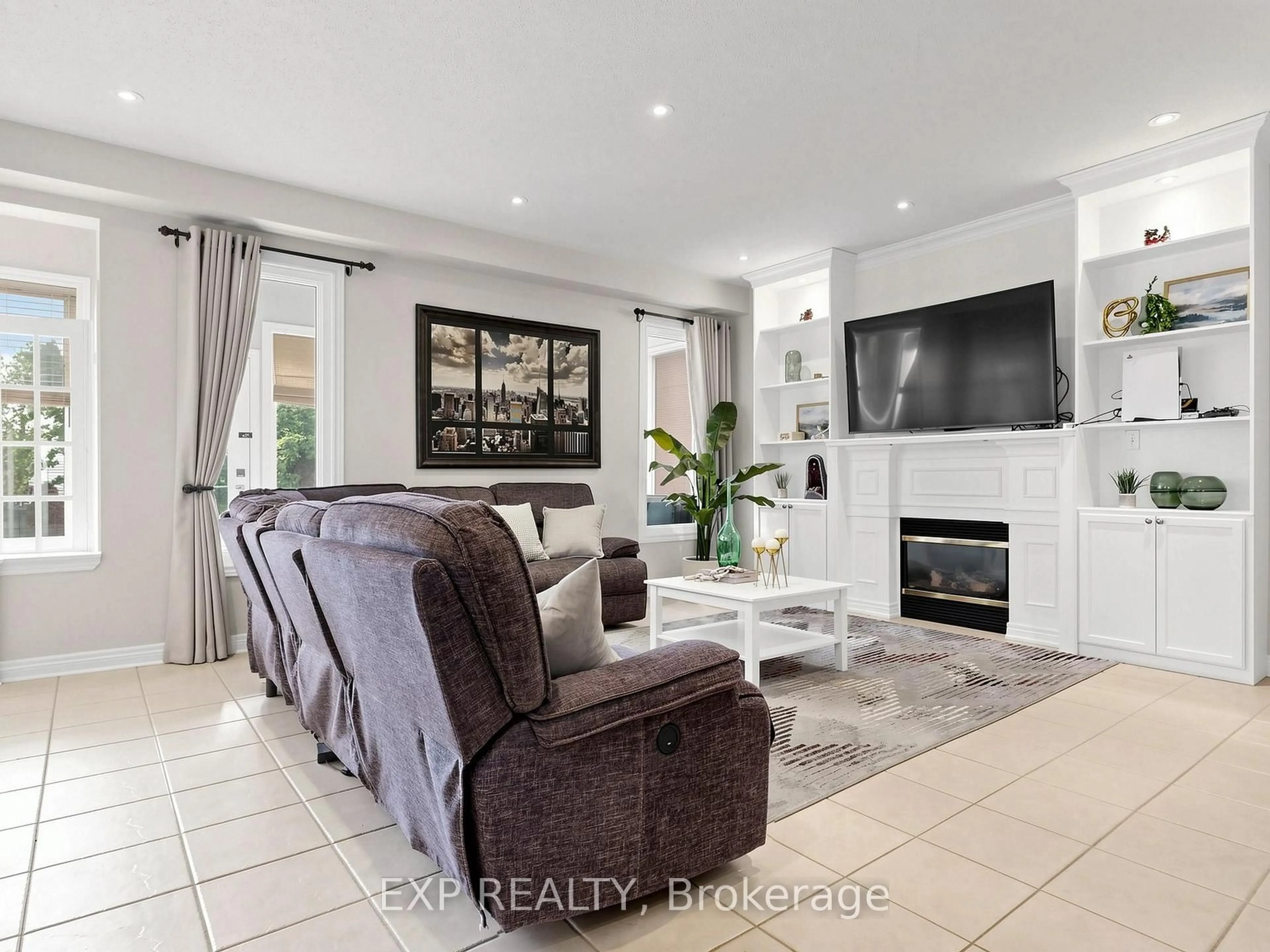 Living room with furniture, ceramic/tile floor for 74 Darius Harns Dr, Whitby Ontario L1M 2G7