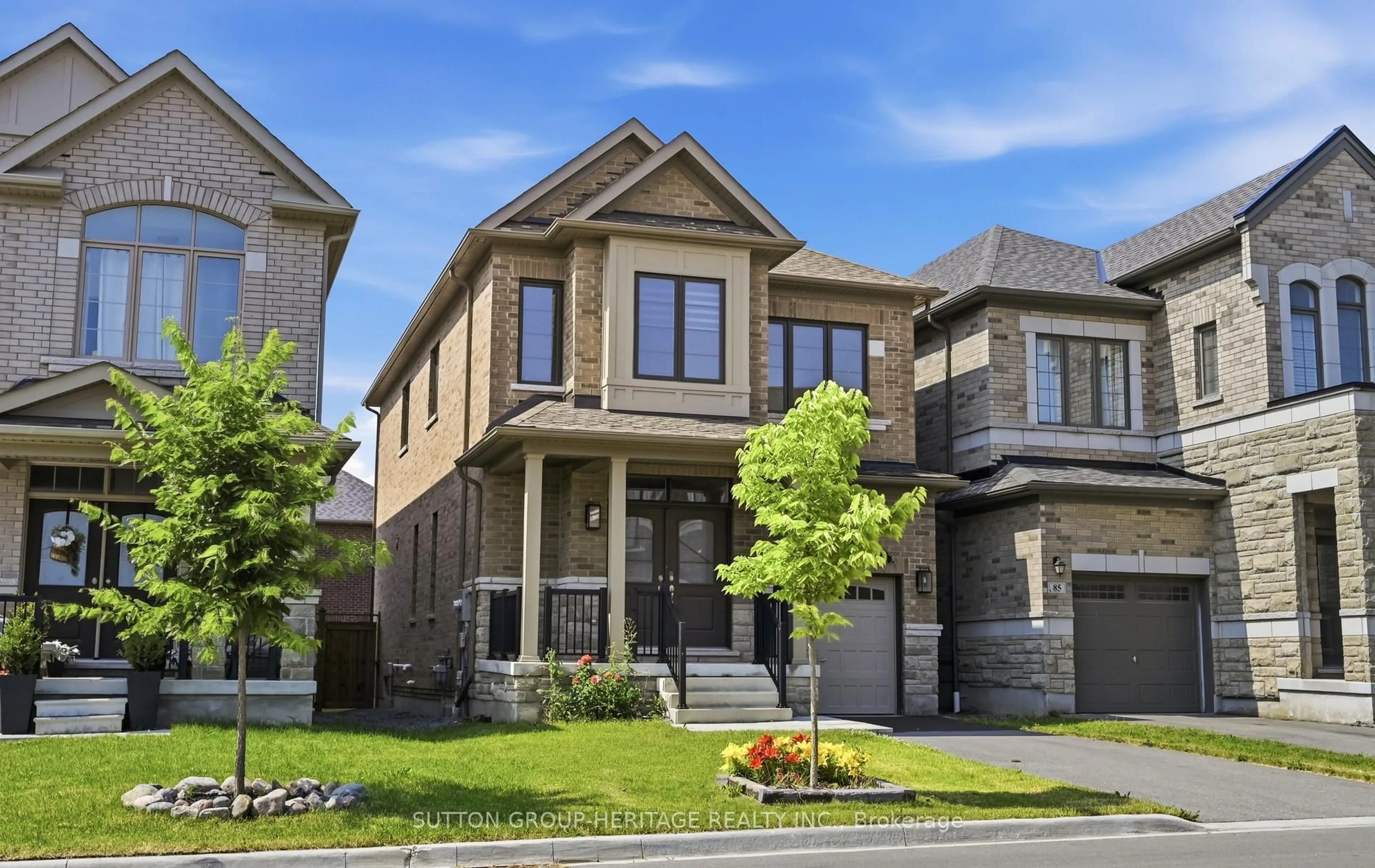 Home with brick exterior material, street for 83 Marcel Brunelle Dr, Whitby Ontario L1P 0G9