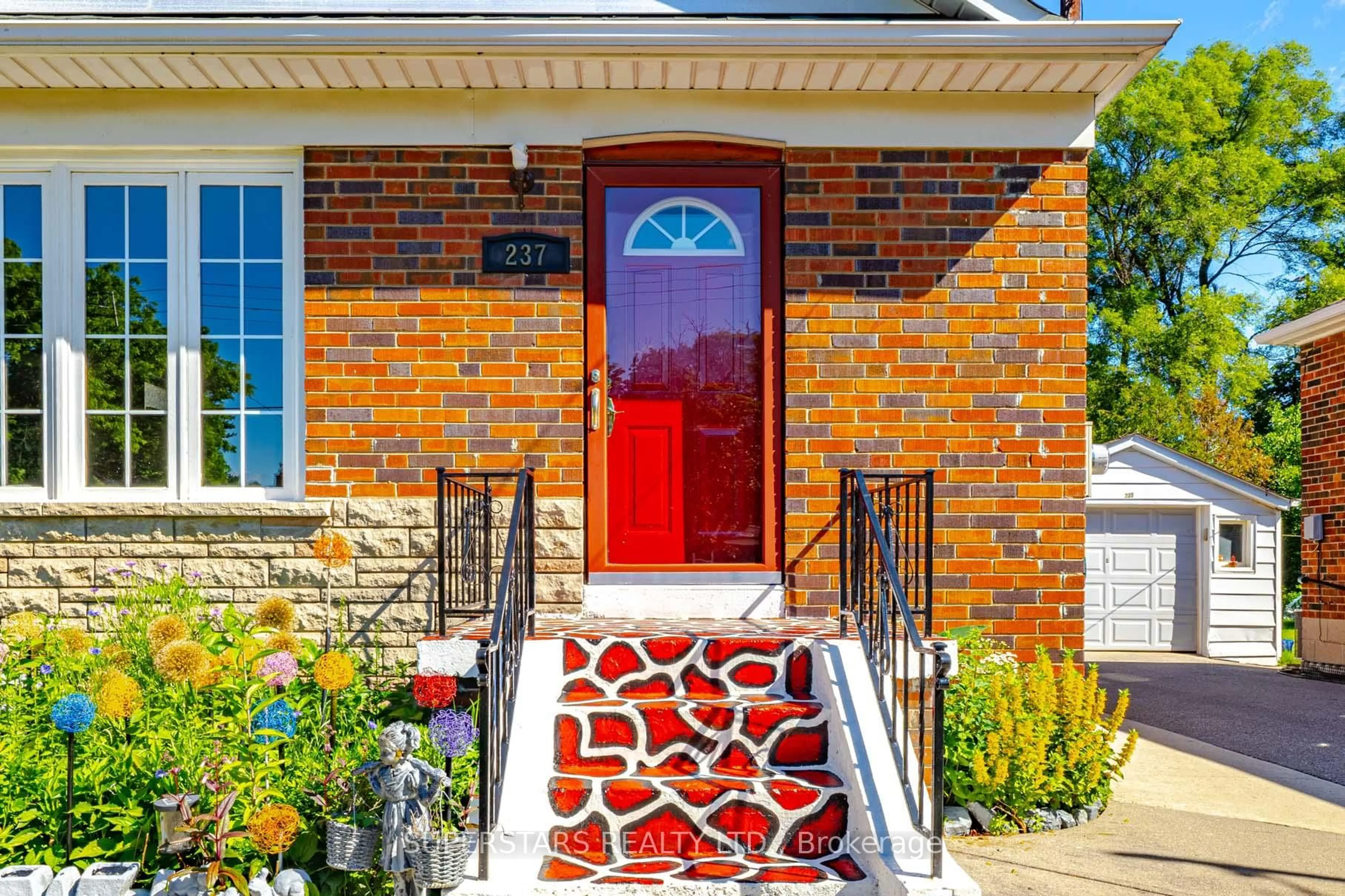 Home with brick exterior material, street for 237 Ellington Dr, Toronto Ontario M1R 3Y2