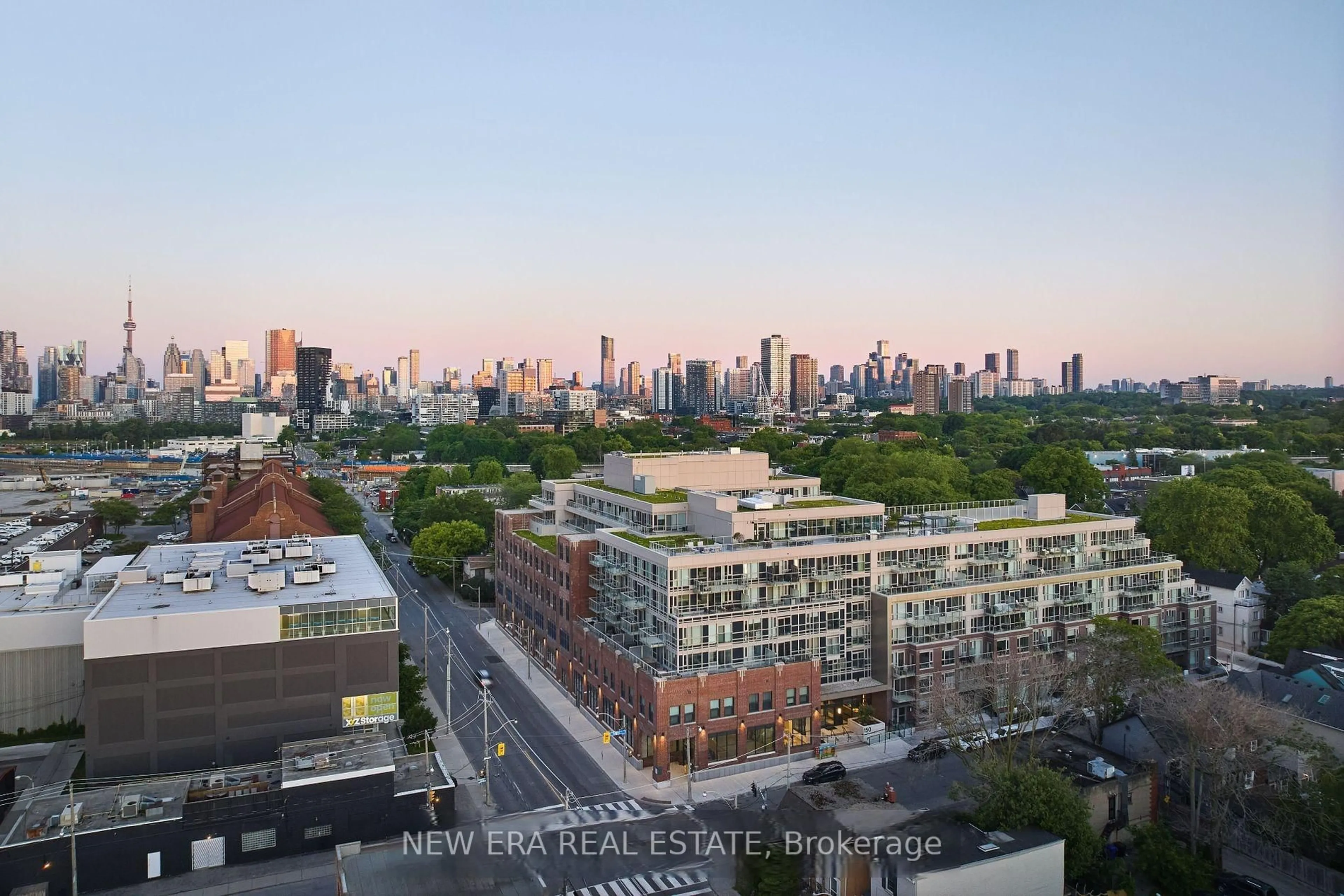 A pic from outside/outdoor area/front of a property/back of a property/a pic from drone, city buildings view from balcony for 150 Logan Ave #301, Toronto Ontario M4M 0E4