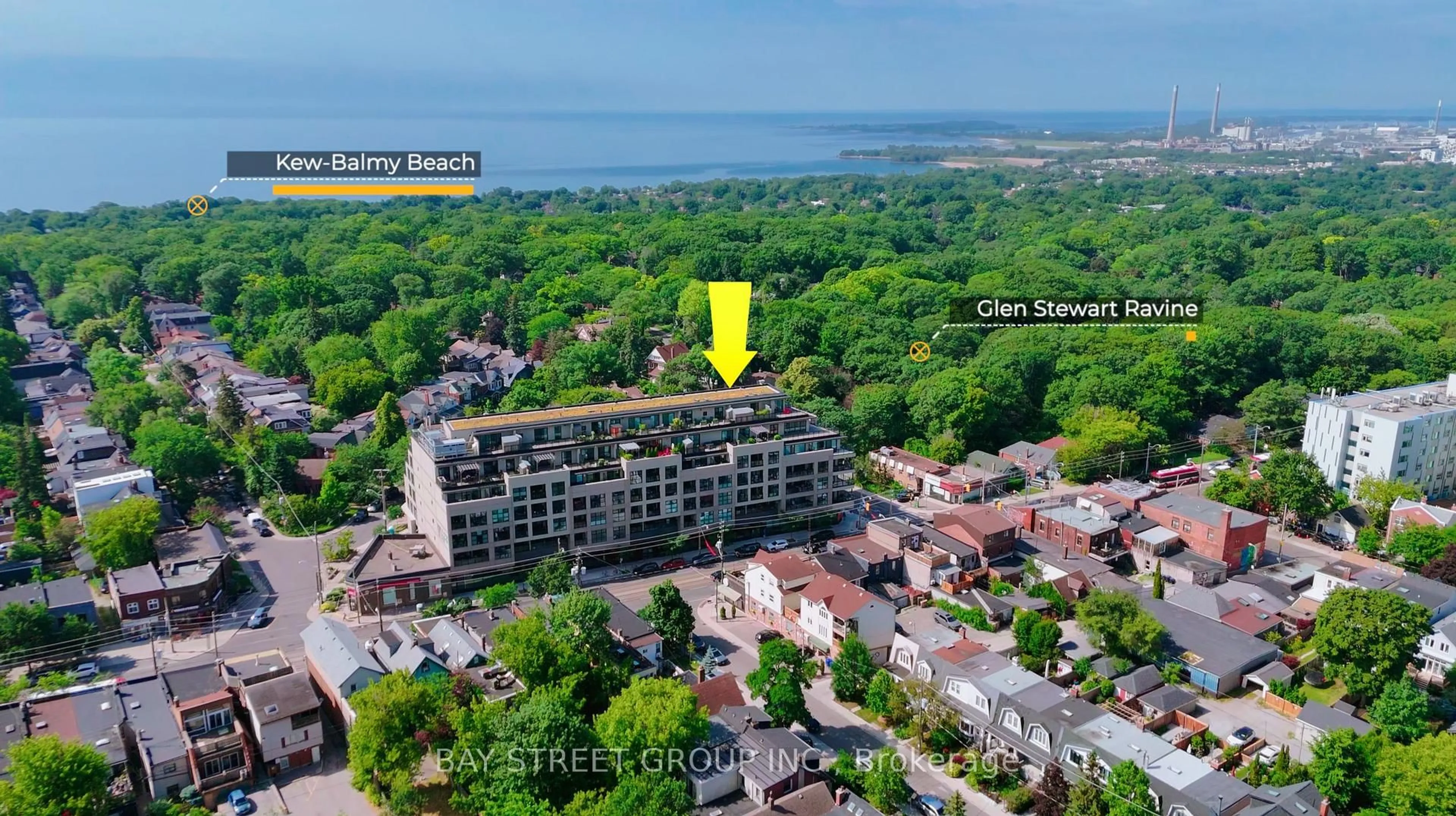 A pic from outside/outdoor area/front of a property/back of a property/a pic from drone, water/lake/river/ocean view for 365 Beech Ave #208, Toronto Ontario M4E 0C2