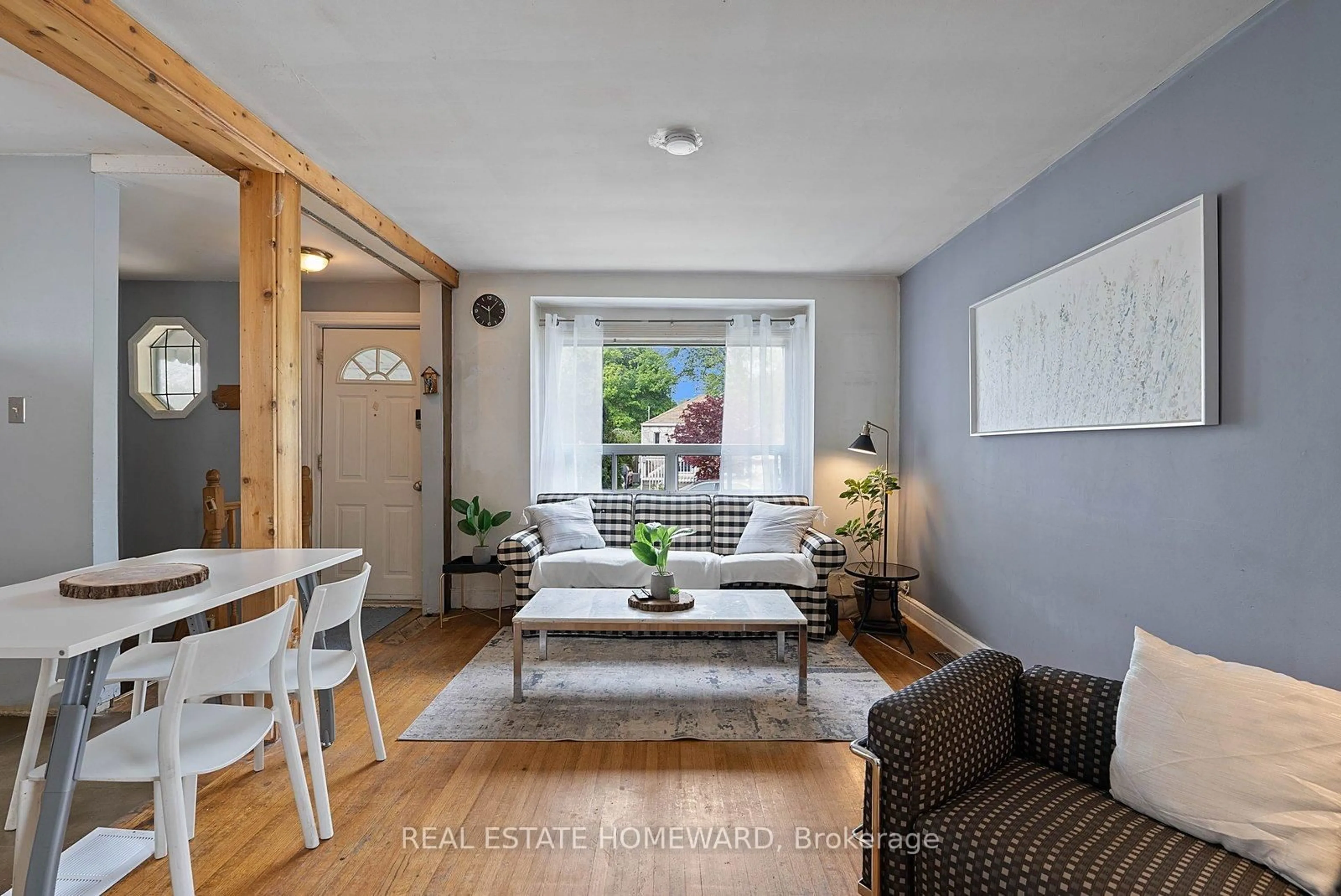 Living room with furniture, wood/laminate floor for 59 Manderley Dr, Toronto Ontario M1N 3G1